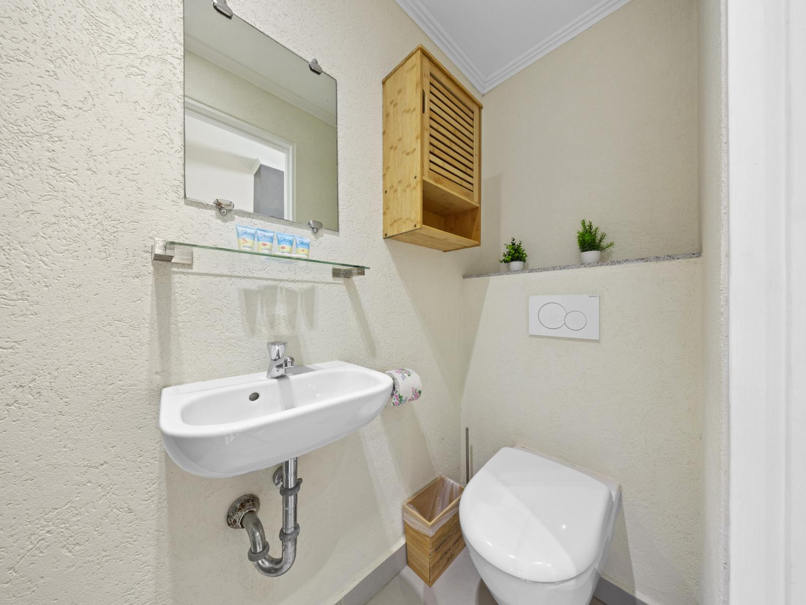 Experience the convenience of our ensuite bathroom, equipped with everything you need for a relaxing stay.