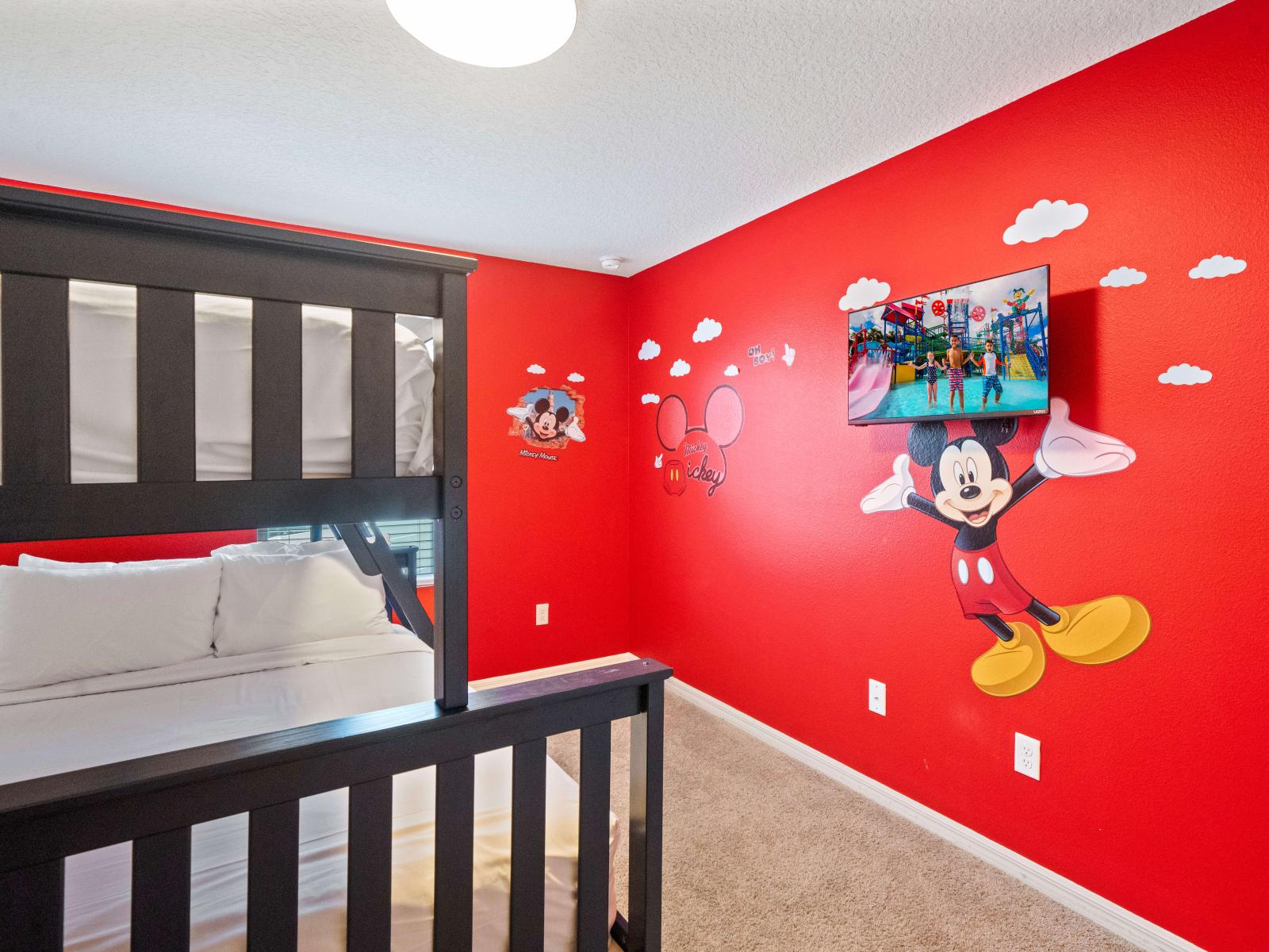 Comfy Bedroom of the Townhouse in Kissimmee Florida  - Smart TV and Netflix - Double bed and a single bed - Experience Disney Magical World with a Micky Mouse-themed bedroom.