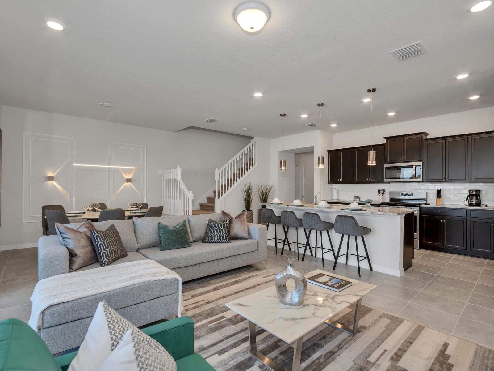 Charming townhouse in Davenport Florida - Plush and comfortable seating arrangements - Spacious open-plan design for a modern feel - Stylish, contemporary furnishings enhancing the aesthetic