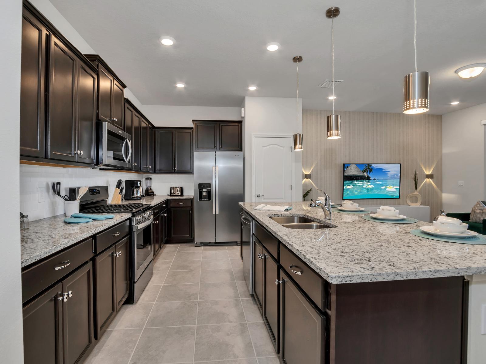 Lofty kitchen of the townhouse in Davenport Florida - Full equipped - Thoughtful placement of kitchen essentials for easy access - Coordinated kitchen decor for a polished and inviting atmosphere