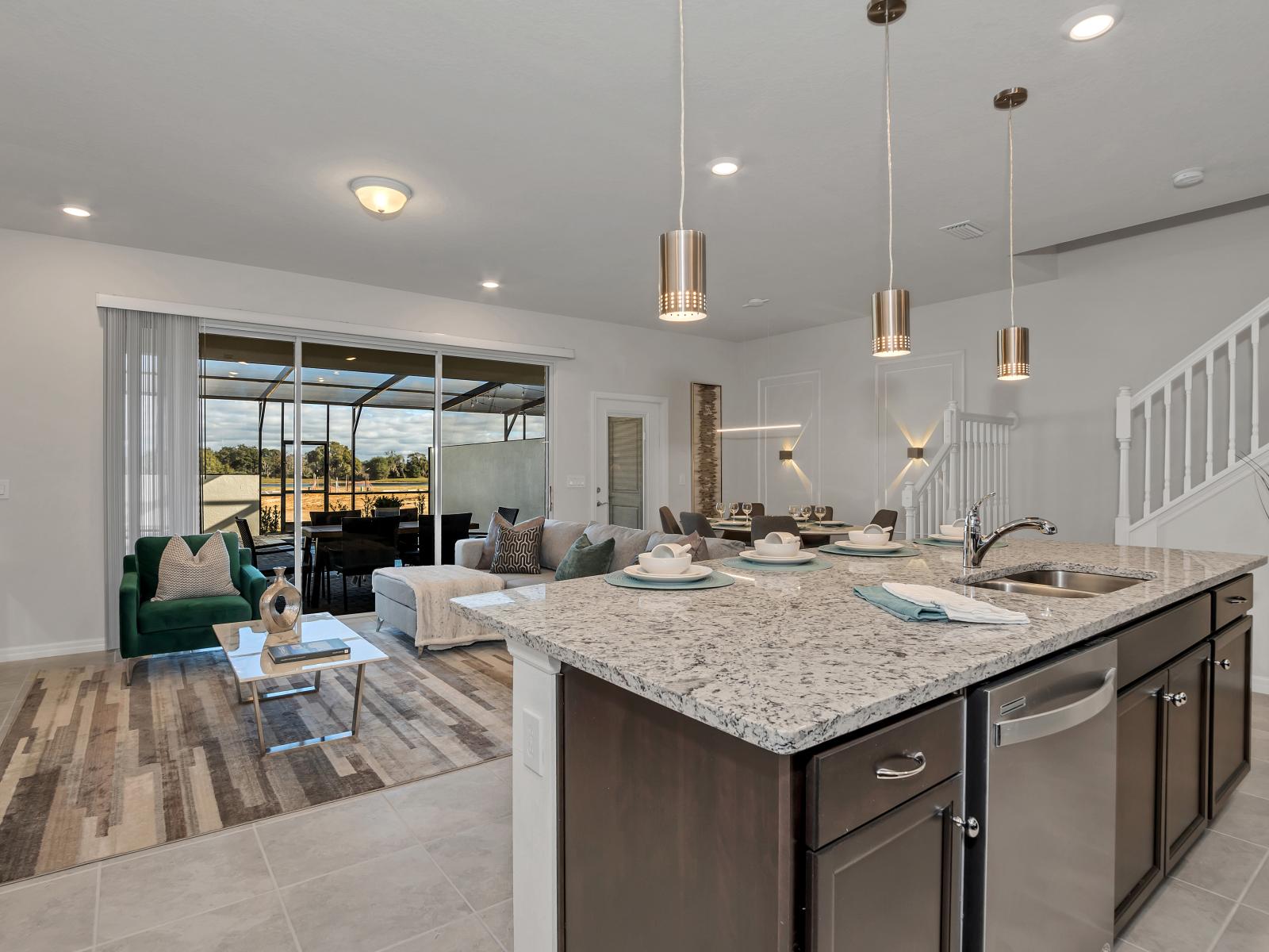 Beautiful townhouse in Davenport Florida - Open-concept living area seamlessly connected to a stylish dining and kitchen - Elegant lighting - Harmonious blend of textures and materials