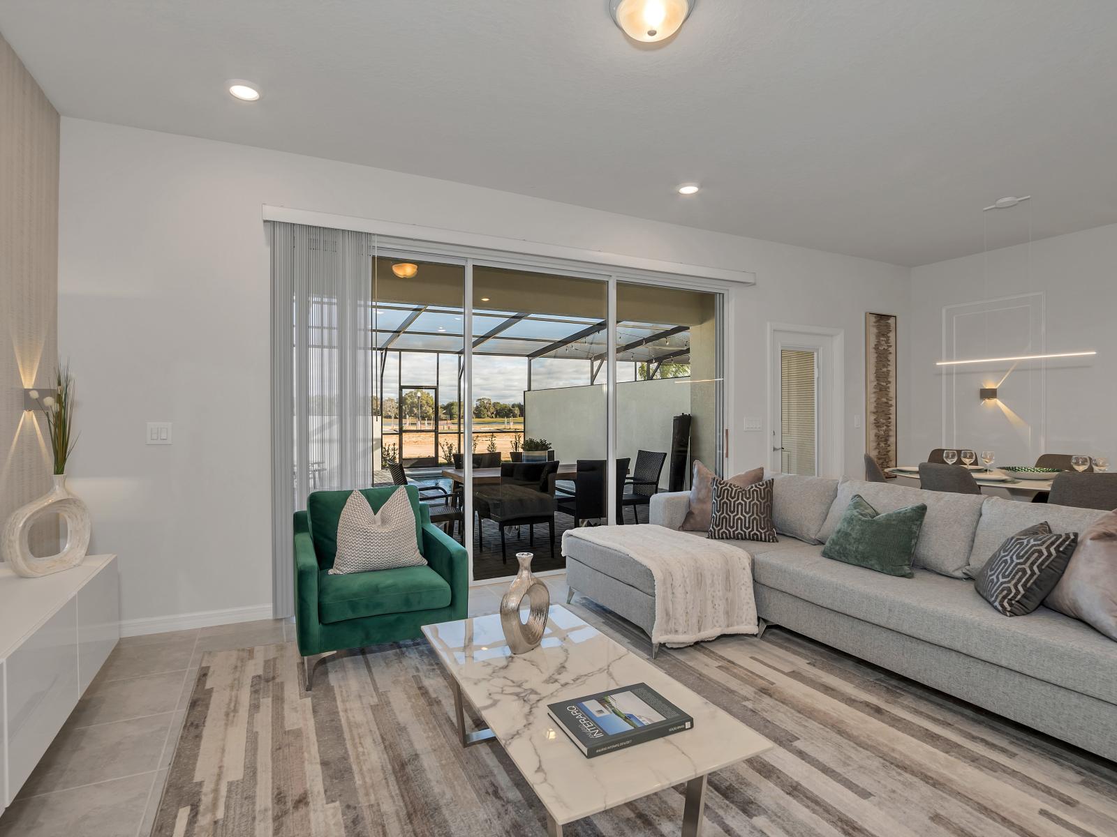 Welcoming living area of the townhouse in Davenport Florida - A living area that effortlessly combines sophistication, comfort, and functionality - Harmonious blend of textures and materials creates a visually stimulating space