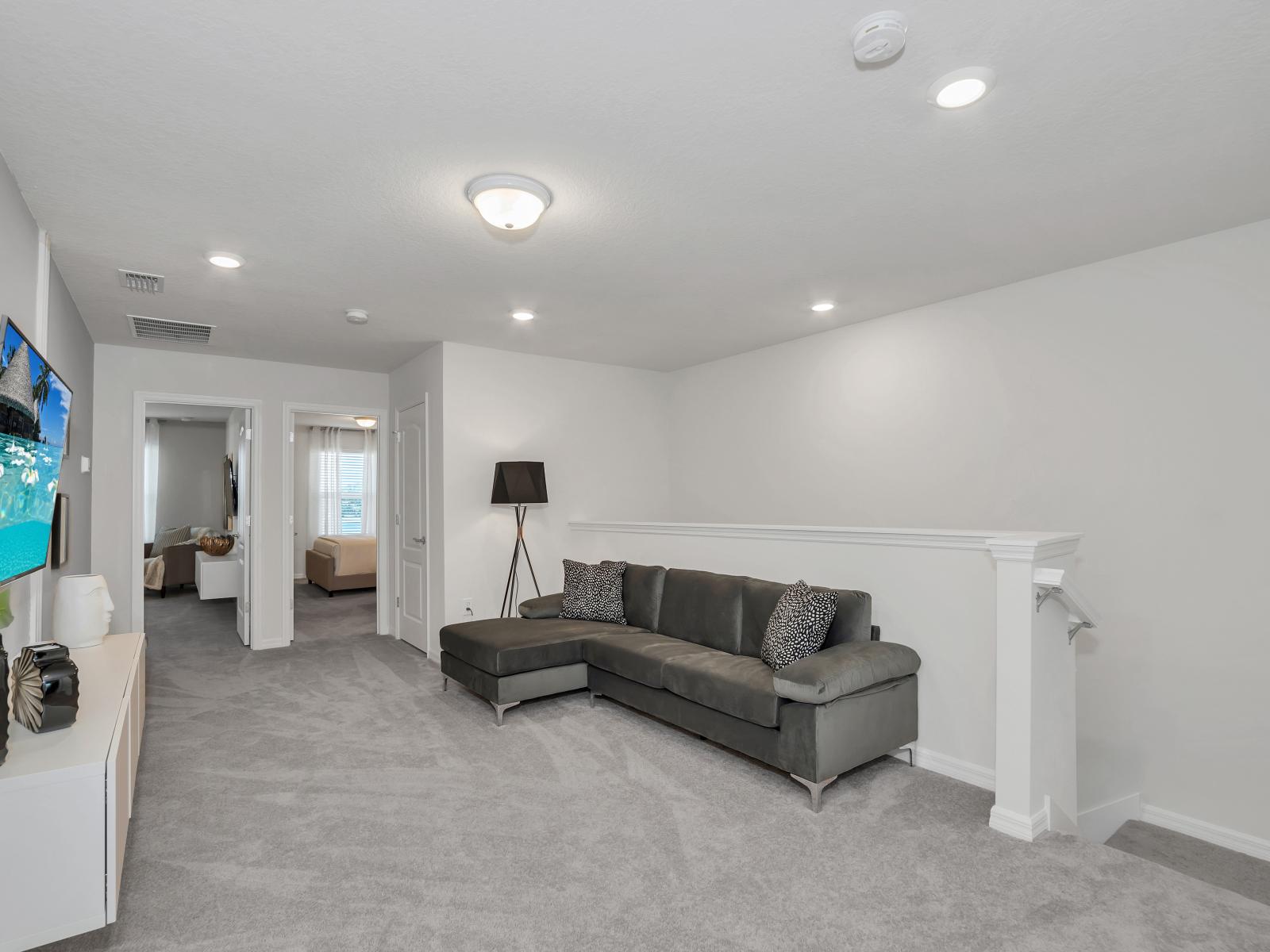 Cozy Loft area of the townhouse in Davenport Florida - Soft, neutral tones and textures creating a calming atmosphere - A cozy retreat where you can relax and recharge in ultimate comfort