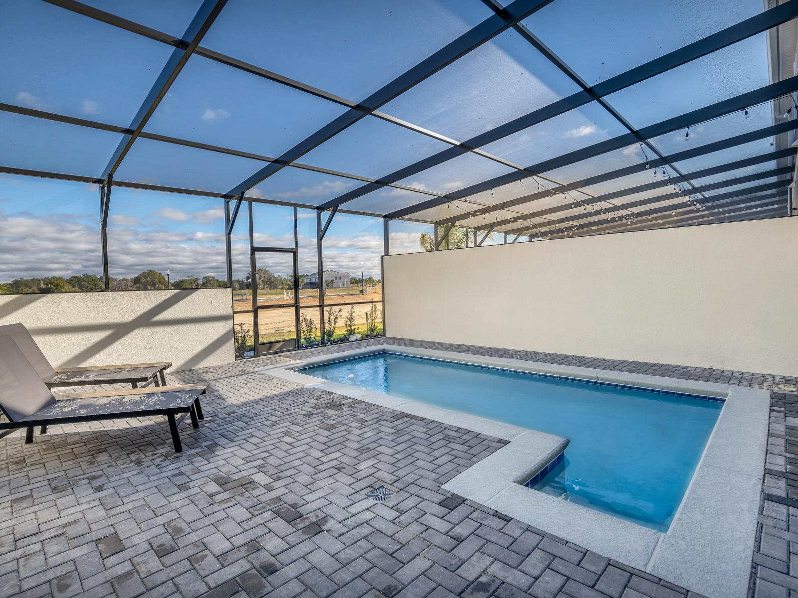 Stunning private pool of the townhouse in Davenport Florida - Sparkling waters creating a serene setting - Comfortable lounge chairs for enjoying cocktails