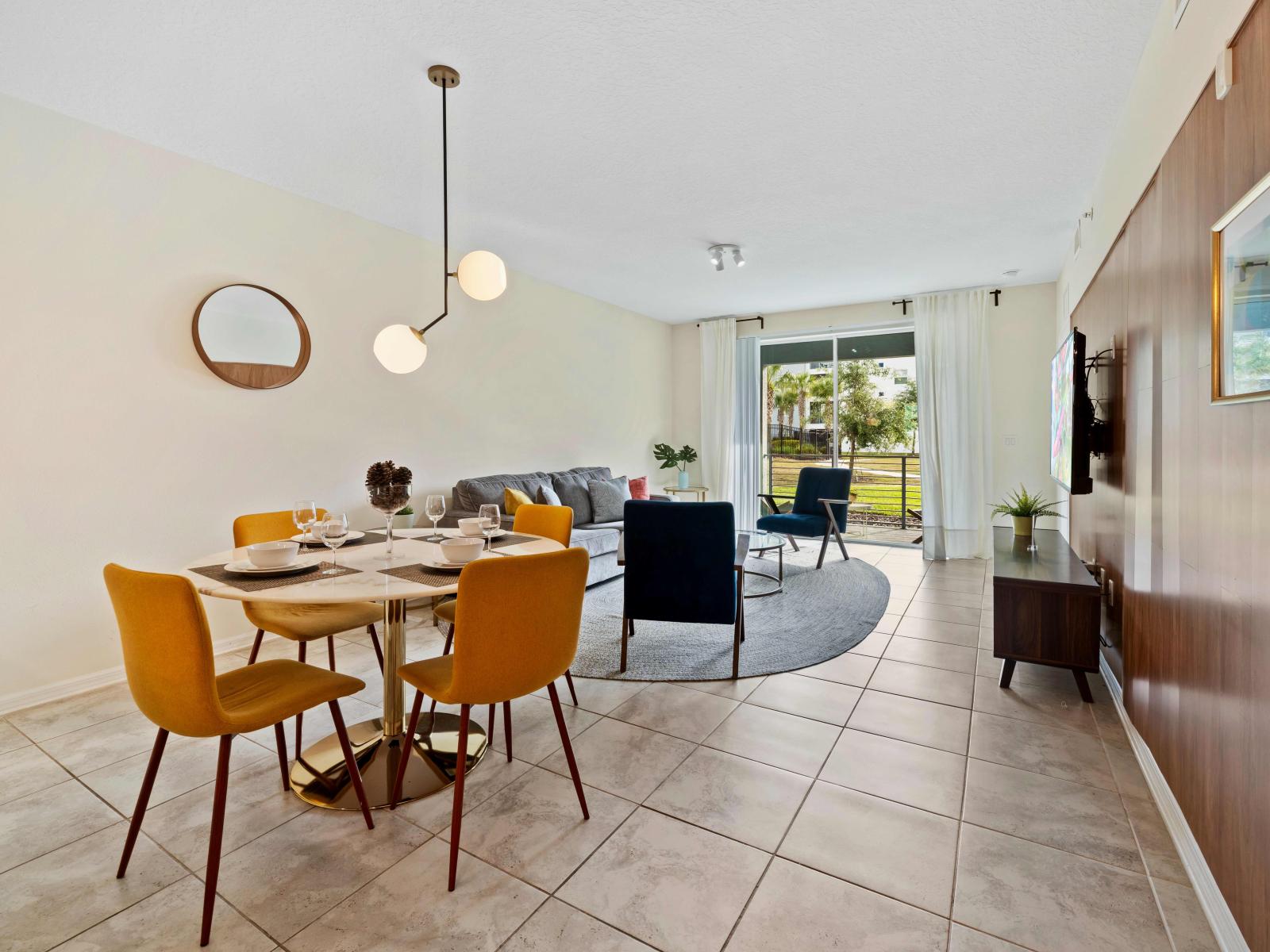 Amazing Dining area of the Condo in Kissimmee Florida - Stylish table and contemporary seating - Artfully arranged table settings for a touch of elegance