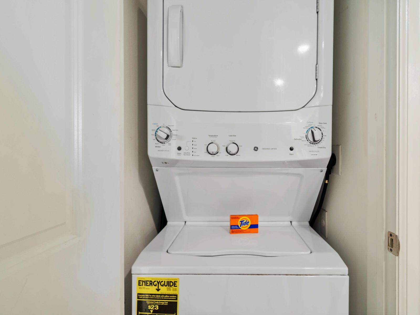 Laundry Area of the Condo in Kissimmee Florida - Chores become a breeze amidst convenience and comfort - Equipped with a washer and dryer - A convenient addition to make your stay even more comfortable