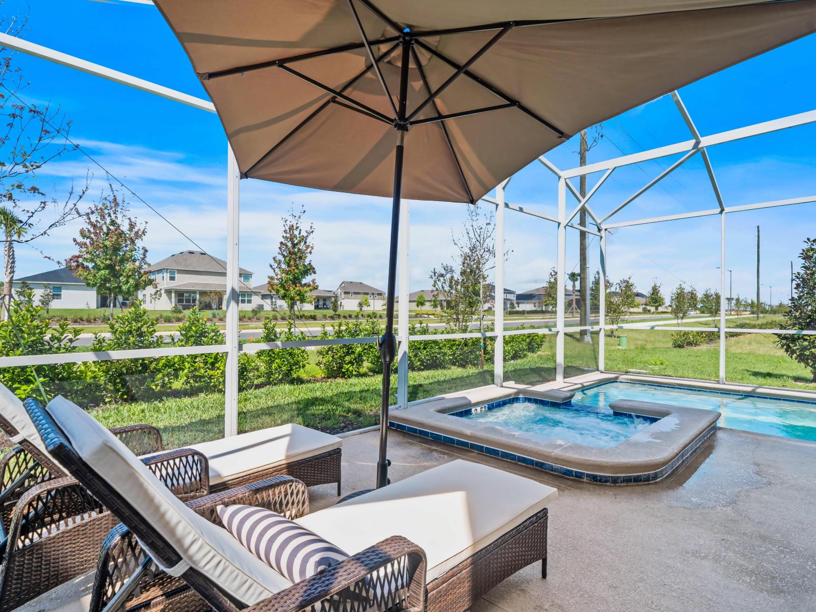 Refreshing Private Pool Area of the Apartment in Kissimmee Florida - Sun lounges - Relax by the shimmering poolside oasis - Lounge in tranquility by the sparkling waters