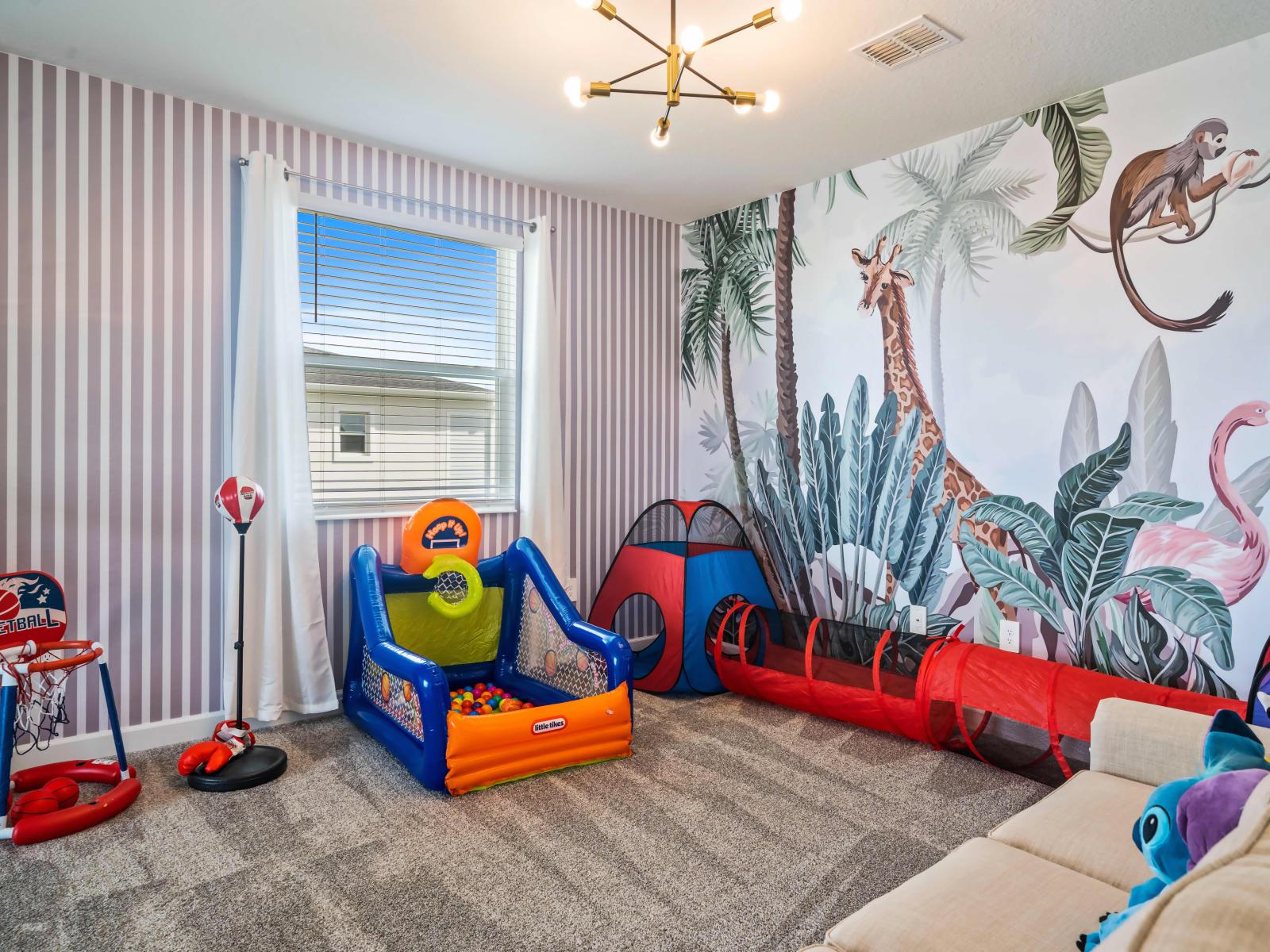 Explore the endless fun awaiting in our loft area of the home in Kissimmee - Filled with games and activities to keep kids entertained for hours. - Dive into excitement and adventure in our loft area. - A world of fun and laughter with games