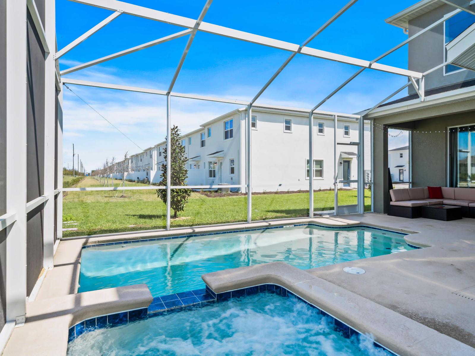 Dive into tranquility in our secluded private pool and spa of the home in Kissimmee - Lounge by the poolside or soak in the soothing spa, surrounded by the beauty - Enjoy the ultimate in privacy and luxury with our secluded pool and spa