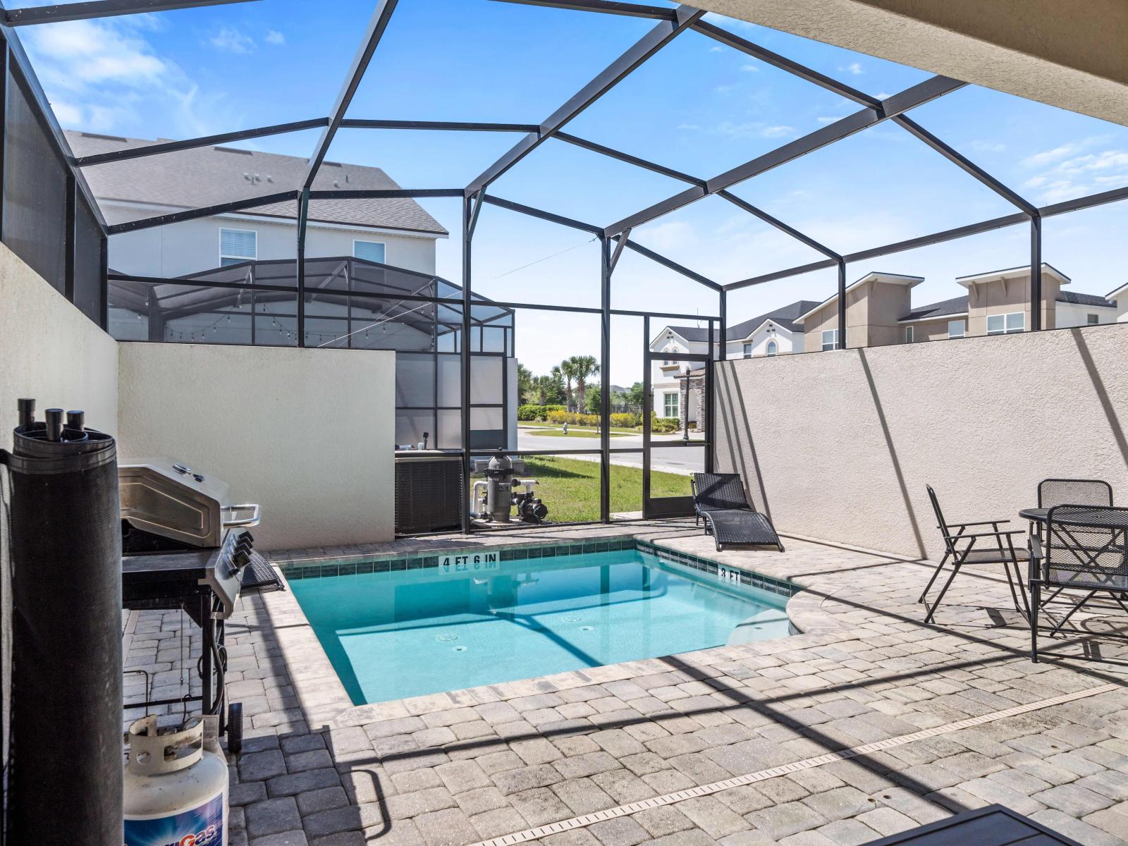 Refreshing private pool area of the home at Kissimmee - Stunning sitting space in complete sunbathed space - Fresh water in pool throughout your stay - Availability of BBQ Grill - Mesmerizing views of the surrounding - Cozy beach chairs to relax