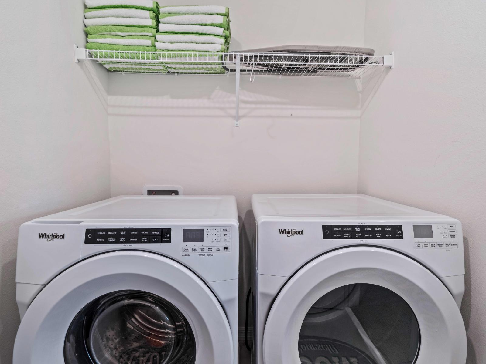 Enjoy the convenience of our laundry area of the in Kissimmee - Equipped with a washer and dryer for hassle-free cleaning during your stay. - Freshen up your wardrobe after washing your cloths in our laundry area