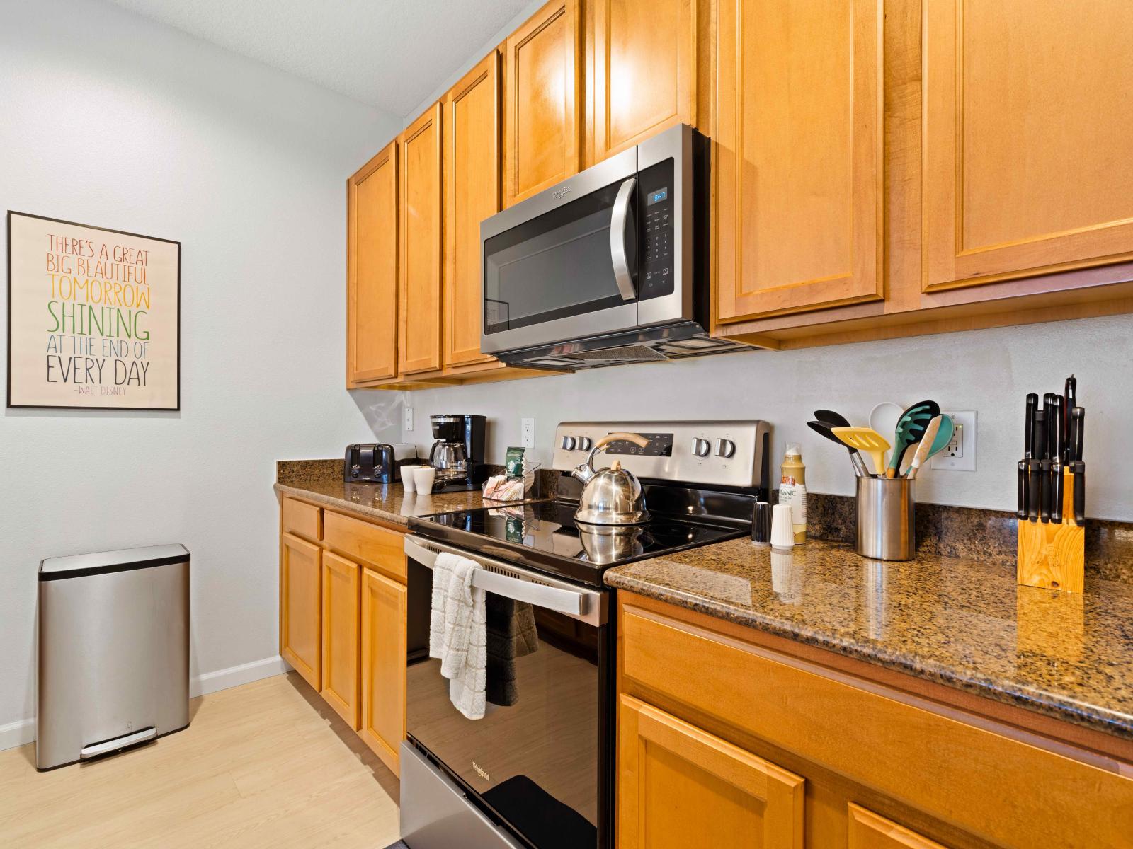 Modern Kitchen of the Townhouse in Kissimmee Florida - Integrated appliances for a seamless and stylish appearance - Full equipped  - Thoughtful placement of kitchen essentials for easy access