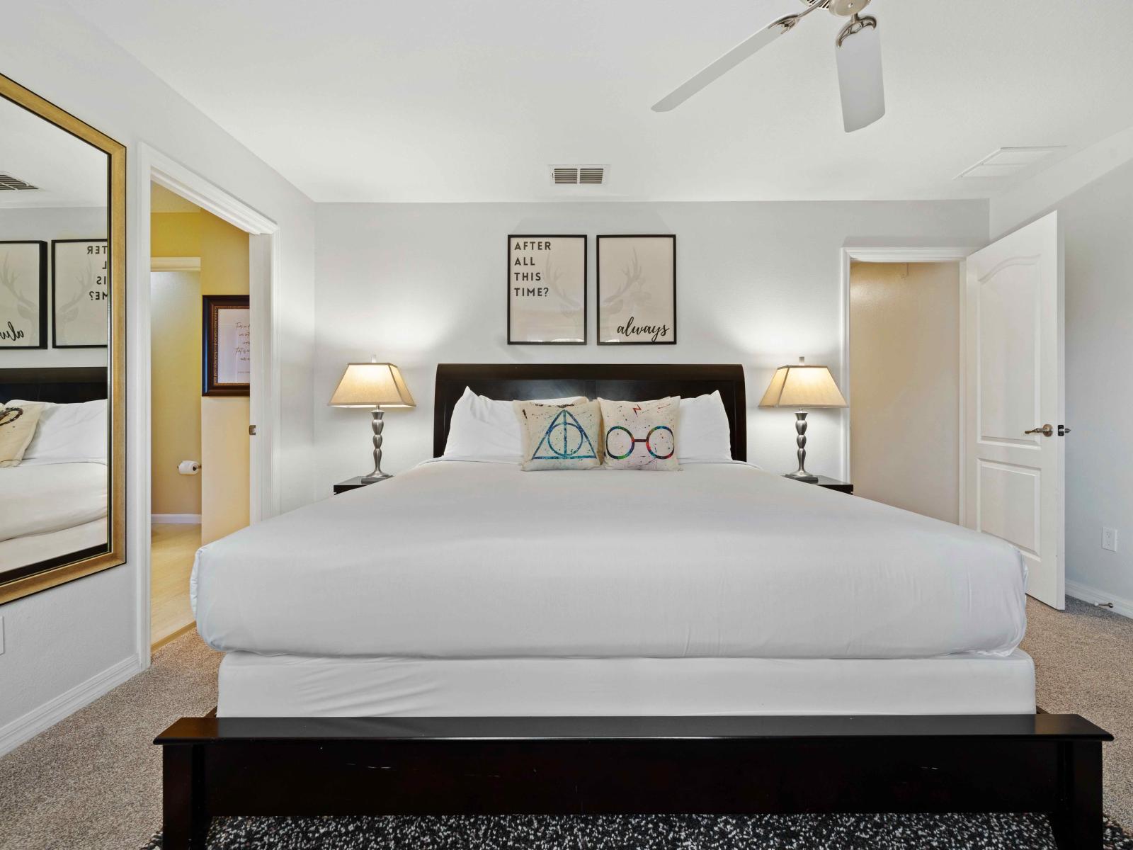 Spacious Bedroom of the Townhouse in Kissimmee Florida - Comfy double Bed - Cozy retreat with a plush bed, perfect for relaxation - Modern amenities for convenience - Full length mirror