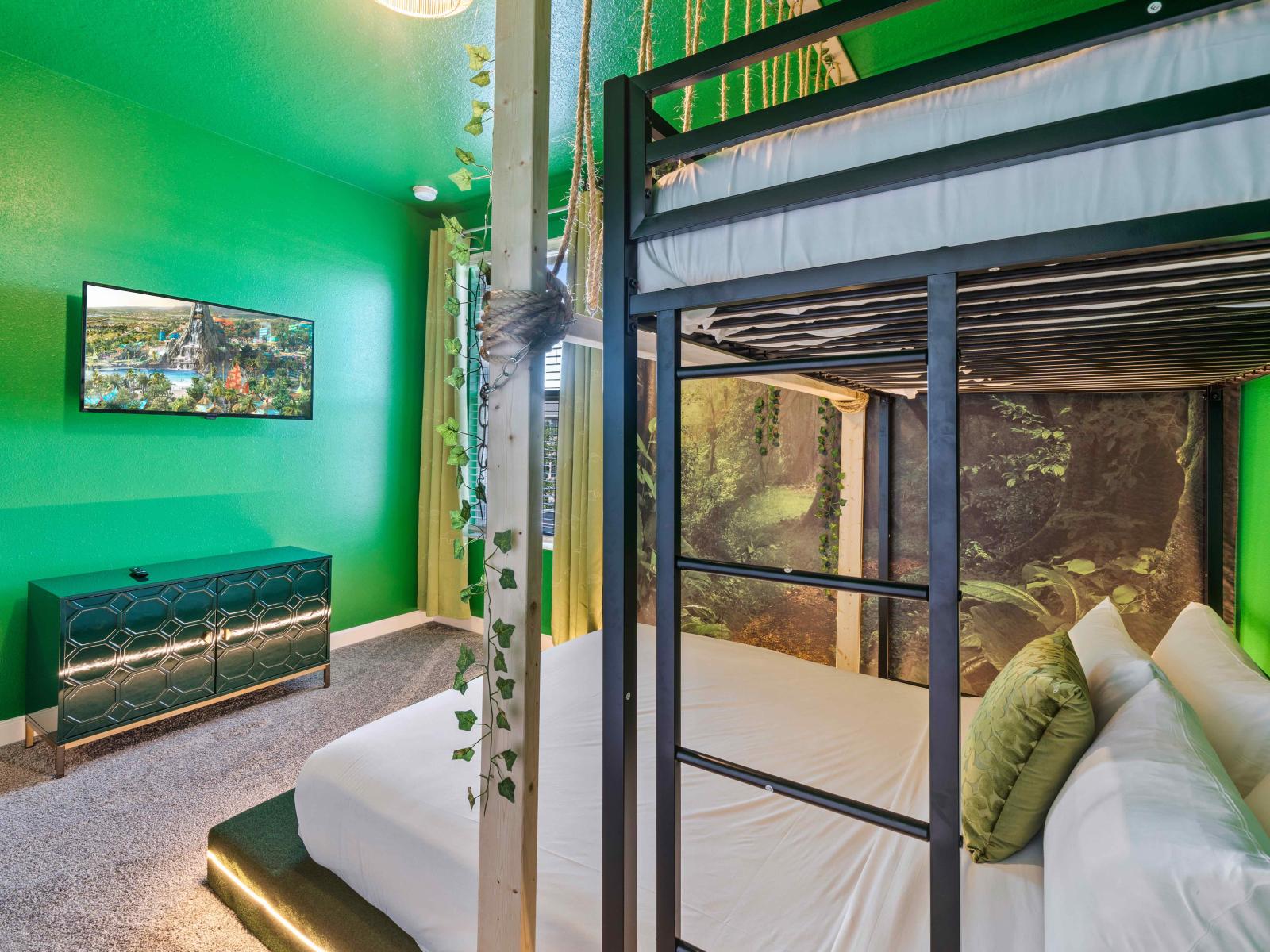 Embark on a wild adventure in our jungle-themed bedroom of the home in Davenport - Cozy double bet and a single bed where every night feels like a safari - Escape to the heart of the rainforest with our jungle themed bedroom