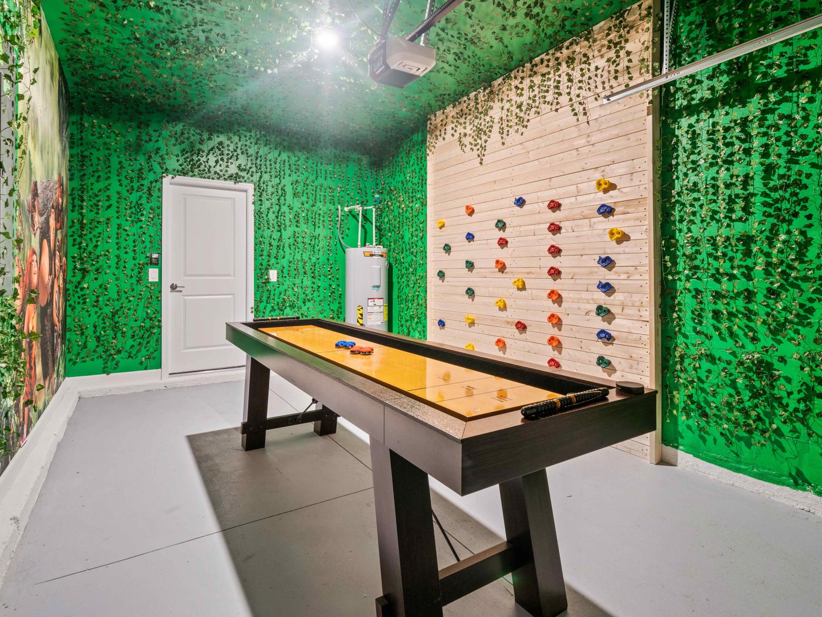 Experience the thrill of the ascent with our exciting climbing wall - fun for the whole family - Slide into vacation bliss with our entertaining shuffleboard - a classic game for unforgettable memories.