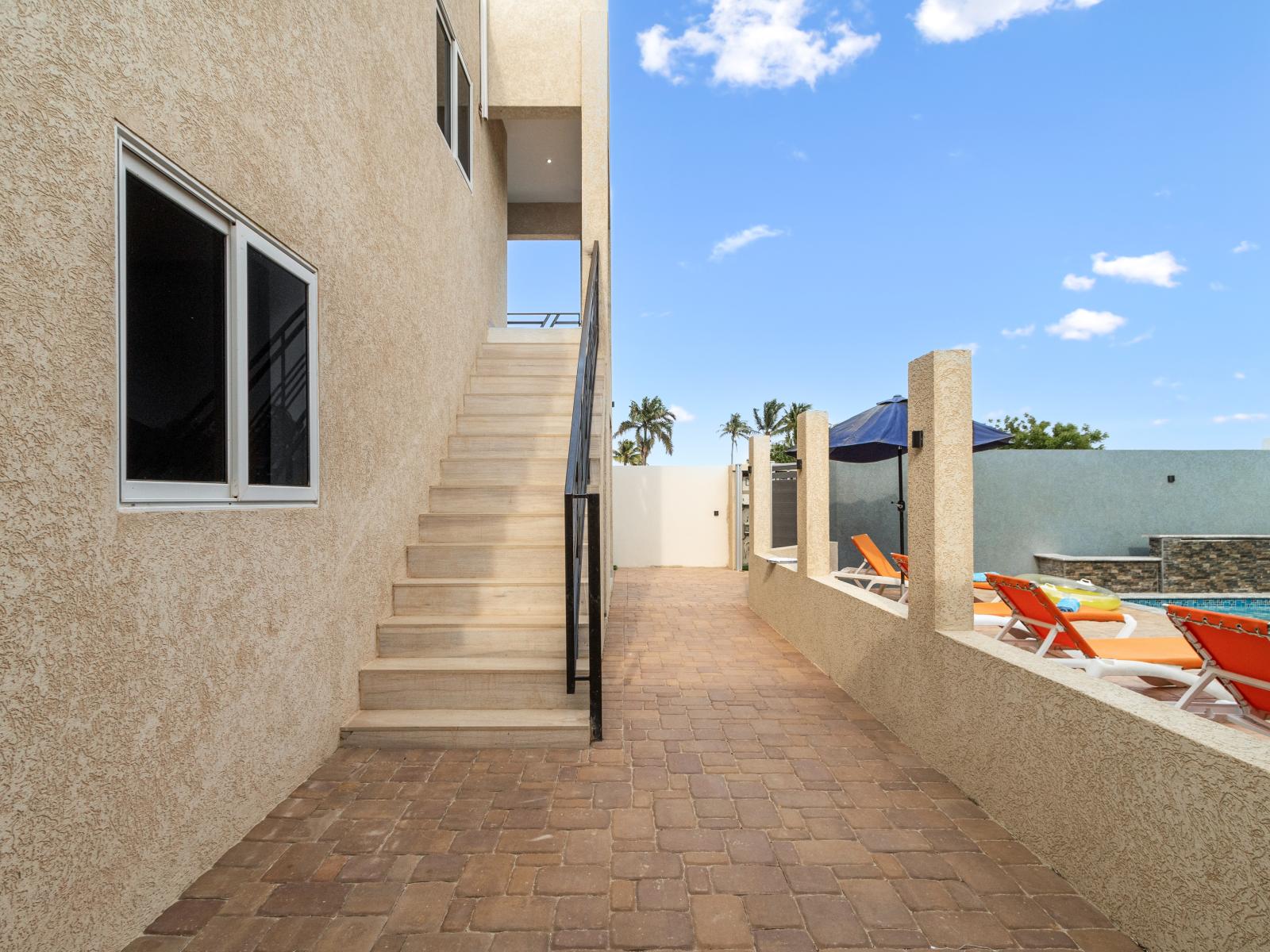 Stairs to the welcoming apartment in Oranjestad Aruba - A tasteful introduction to the comfort that awaits inside - Your exclusive passage to a delightful stay