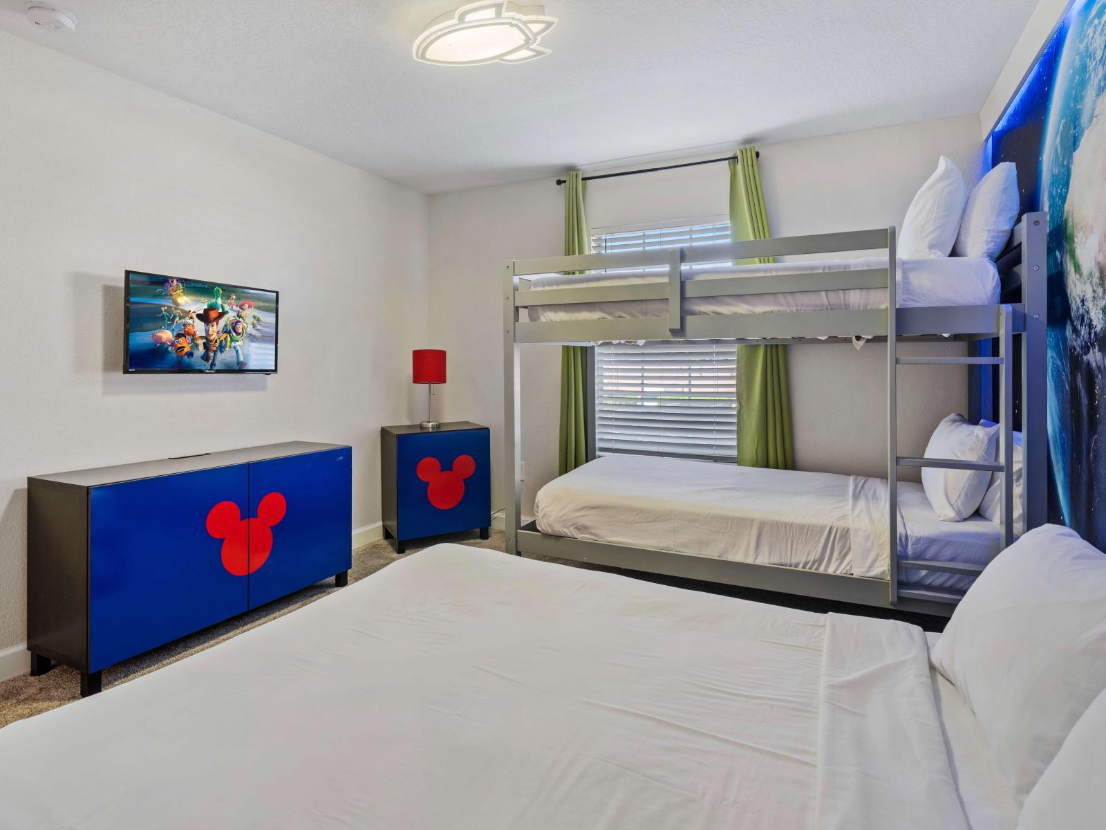 Delightful bedroom of the townhouse in Kissimmee Florida - Mickey Mouse themed bedroom - A tranquil ambiance perfect for unwinding and rejuvenating - Serene escape where you can indulge in ultimate comfort