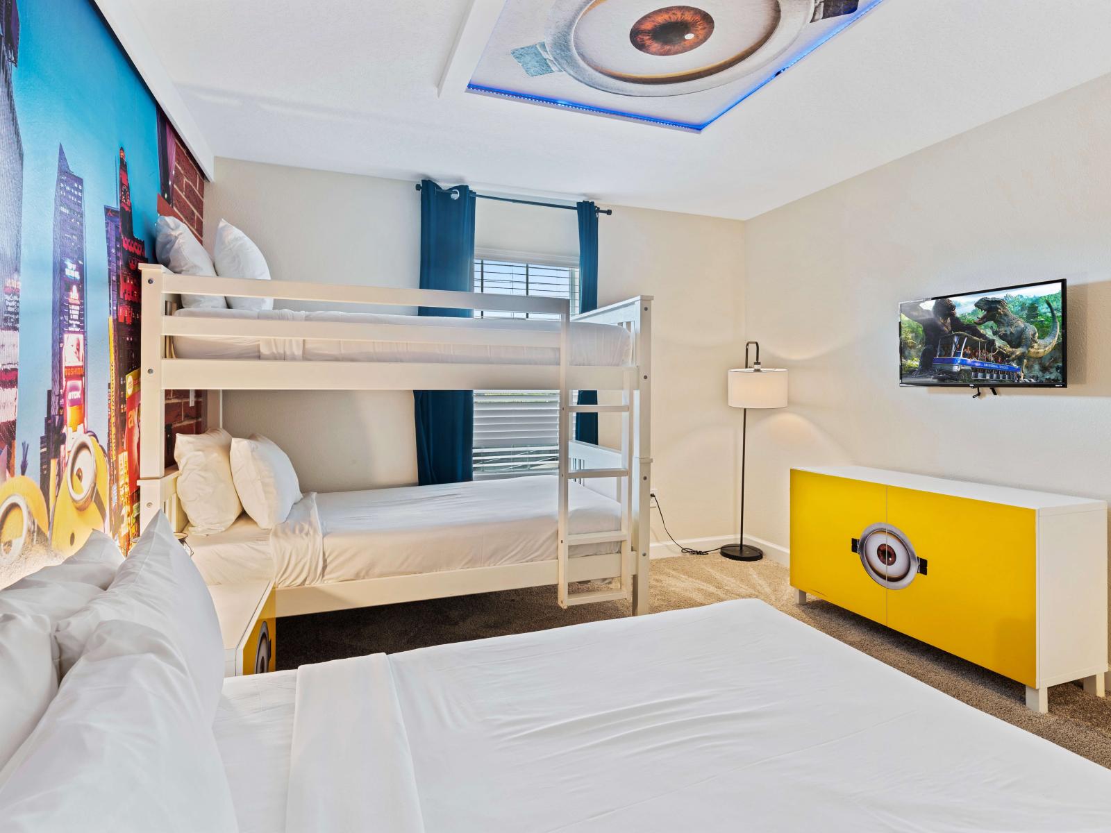 Minion themed bedroom of the townhouse in Kissimmee Florida - A double bed and bunker bed - Thoughtfully designed bedroom featuring functional and stylish furniture - Cozy and inviting ambiance for relaxation