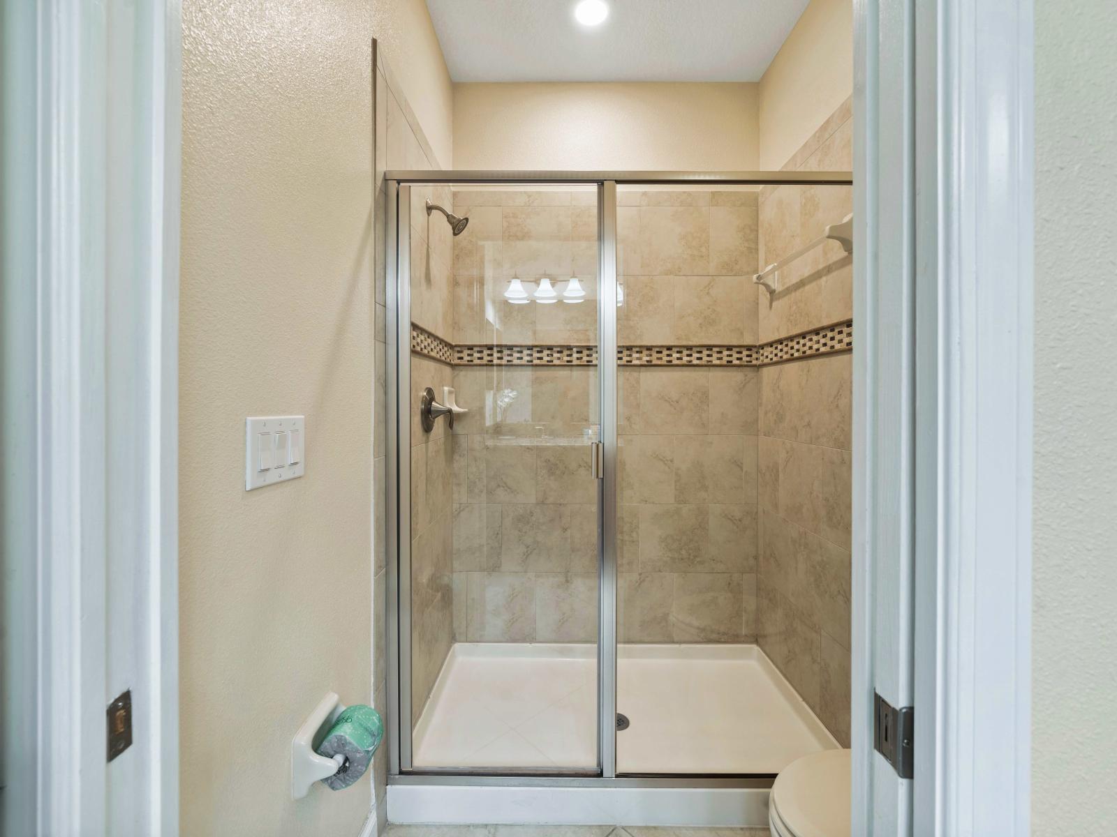 Start and end your day in luxury with our upscale and meticulously maintained bathroom facilities - A glass-enclosed shower adds a modern edge to the seamless design - Clean lines and refined details complete the sophisticated allure