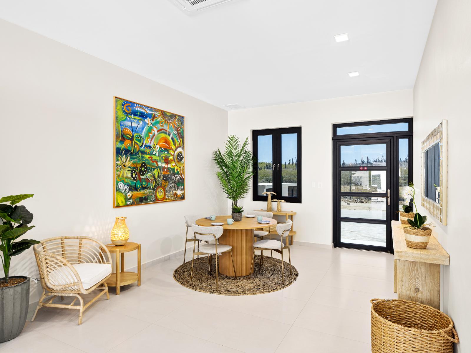 Step into your home away from home through our welcoming entrance of the apartment in Noord Aruba - Stylish decor and thoughtful touches set the tone for an unforgettable stay - Modern design and cozy ambiance greet you at the door in this retreat