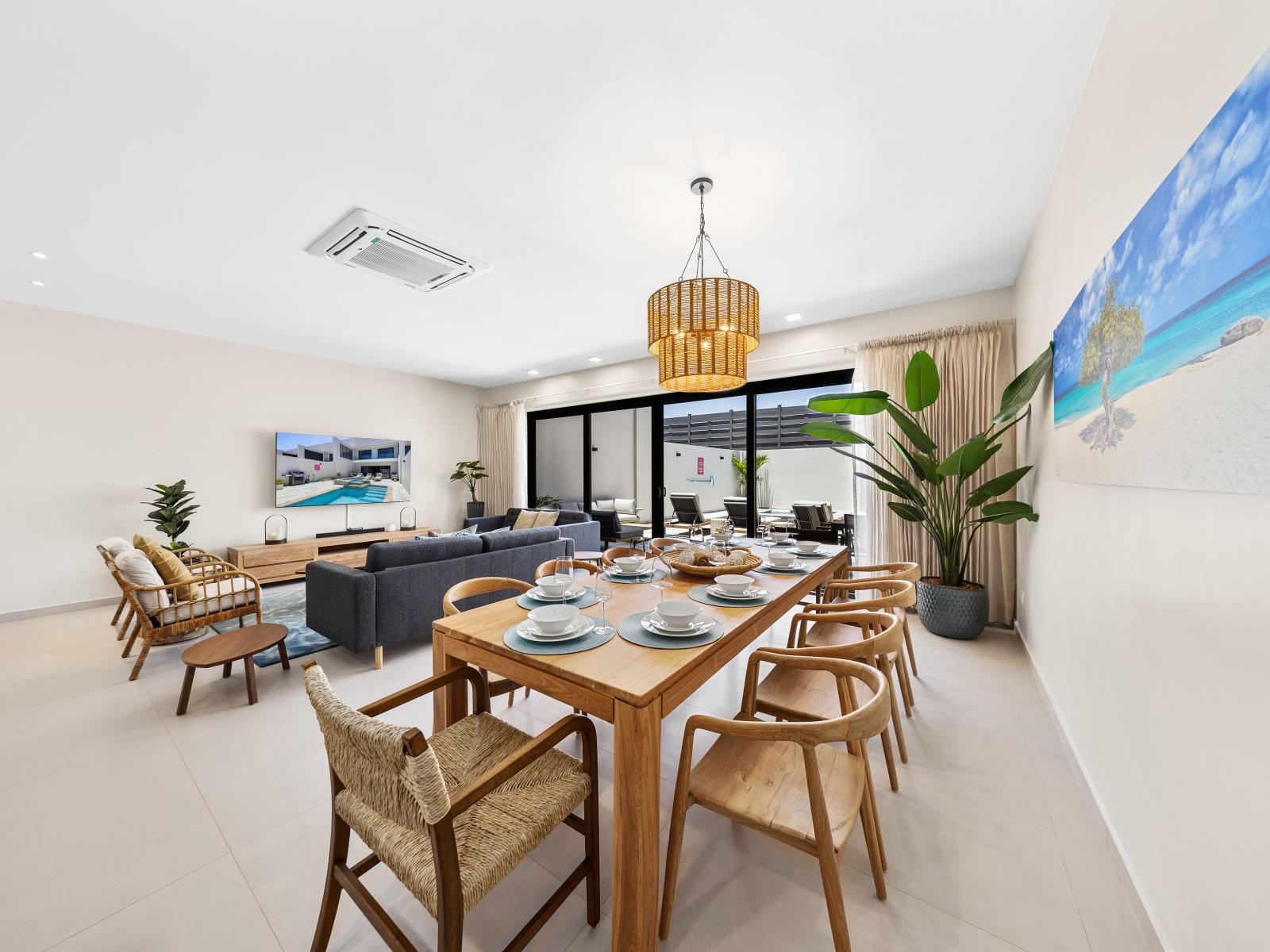 Embrace the elegance of open concept living and dining area of the apartment in Noord Aruba - Seamless flow of modern living in, where the living area and dining area blend harmoniously - Well-planned layout maximizing comfort and functionality