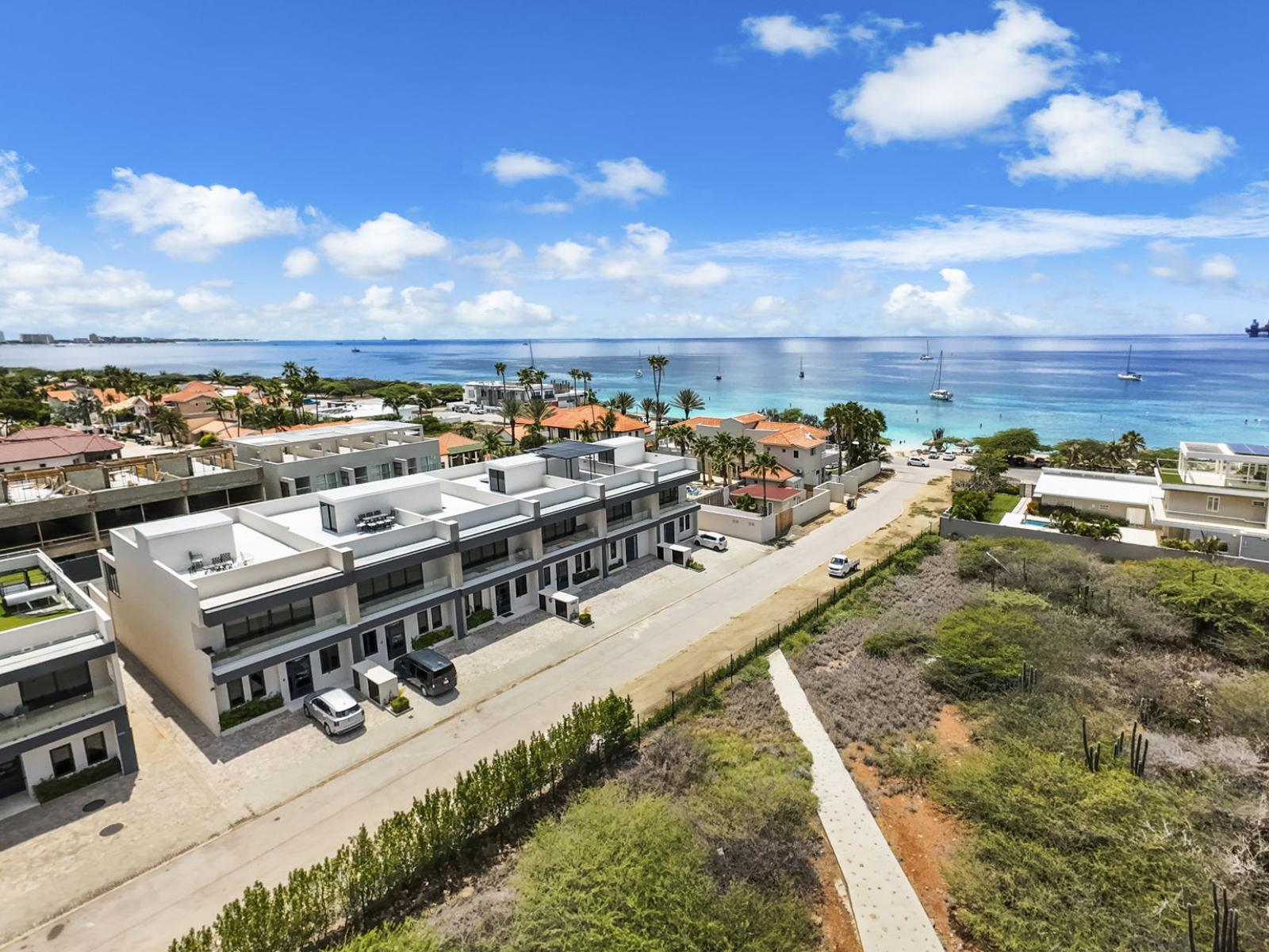 Step outside and feel the sand between your toes in just one minute! Our apartment offers the ultimate beachside convenience, with the shore mere steps away.