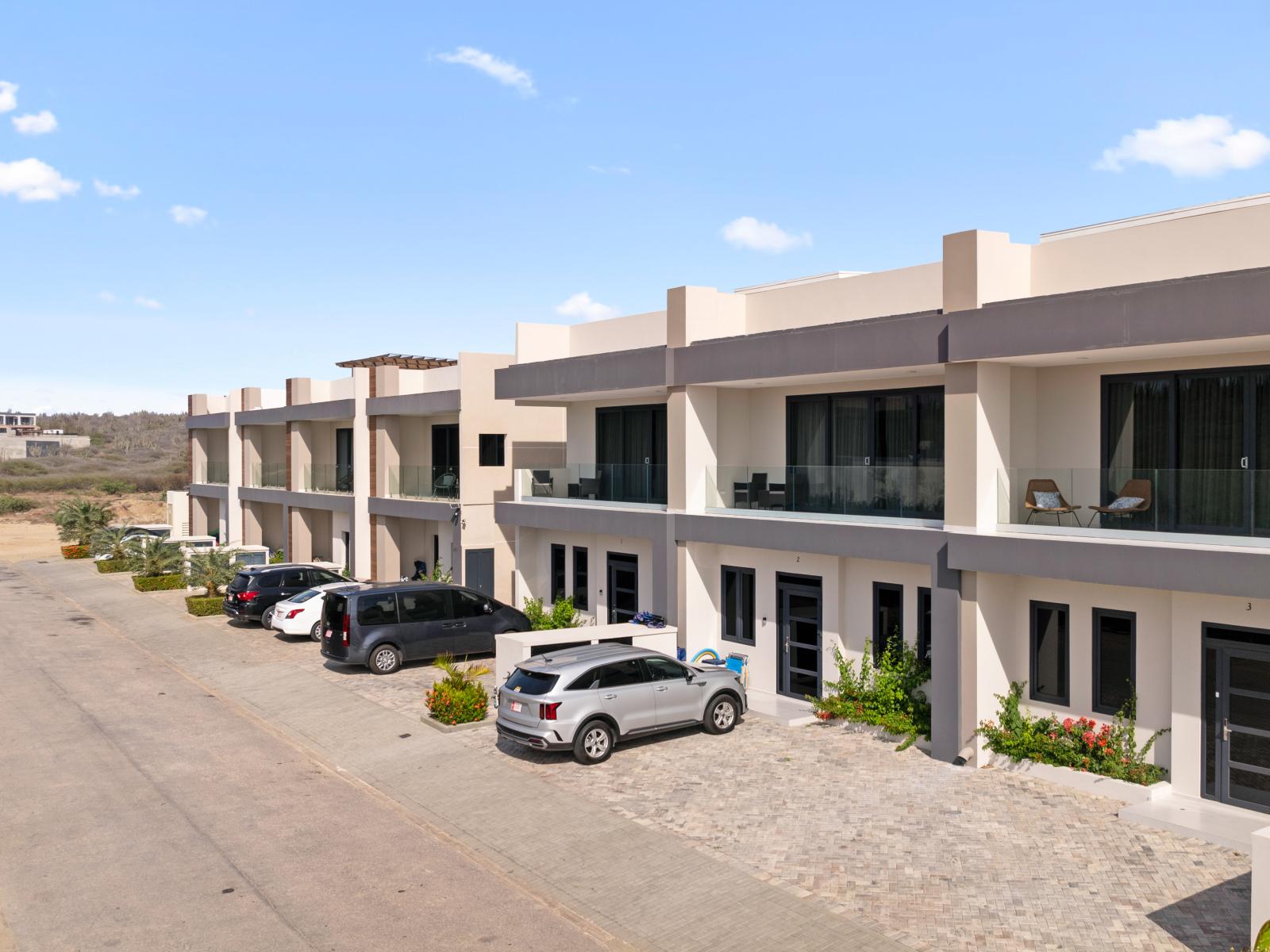 Behold the inviting entrance of our apartment, where modern style meets welcoming charm. Your home away from home awaits just beyond these doors.