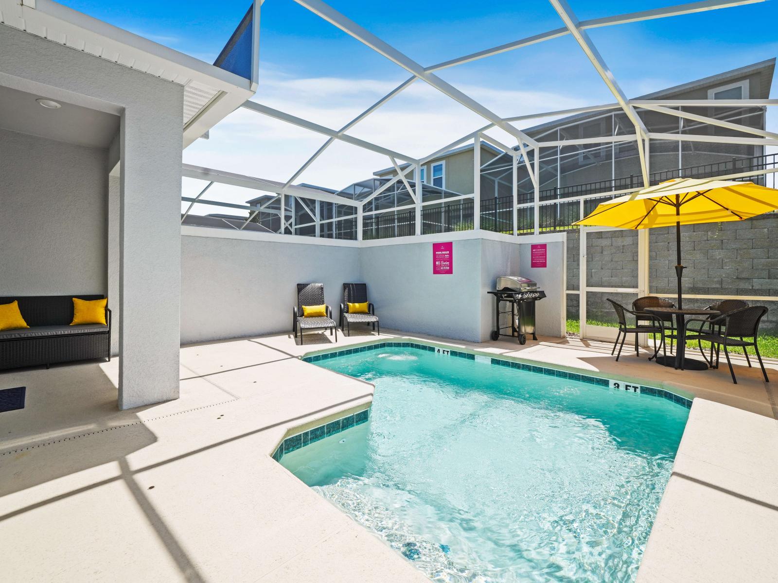 Experience pure bliss in private pool of the townhouse in Davenport Florida - Enjoy leisurely moments in inviting pool area with plenty of seating - Lounge in tranquility by the sparkling waters, enjoy BBQ and dine in shade