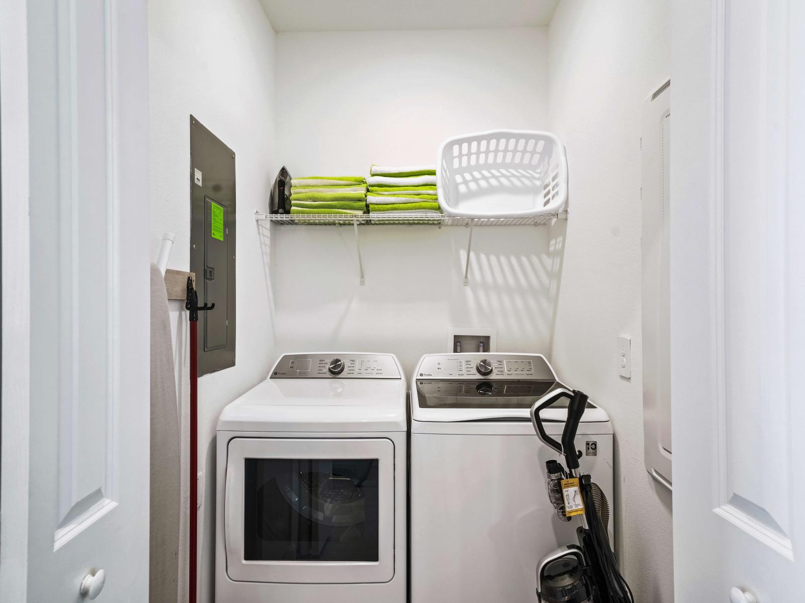 Laundry area of the townhouse in Davenport Florida - Experience the convenience of equipped laundry area - Allowing to refresh your clothes at your own pace with free washer and dryer