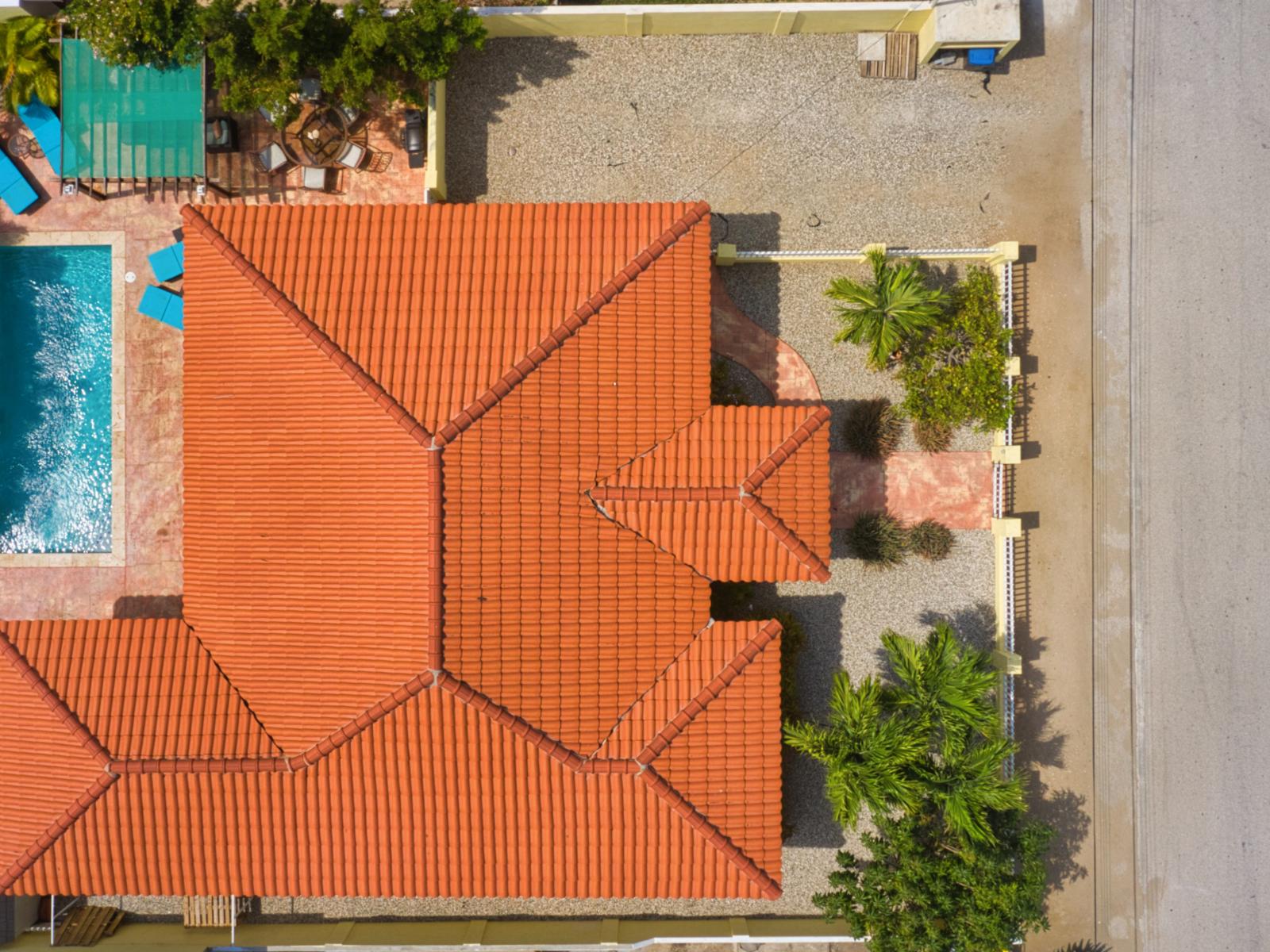 Experience a bird's eye view of your dream getaway with private pool - Unlock the beauty of tranquil retreat from a unique aerial perspective - Get a taste of paradise with mesmerizing shot, showcasing the beauty of home