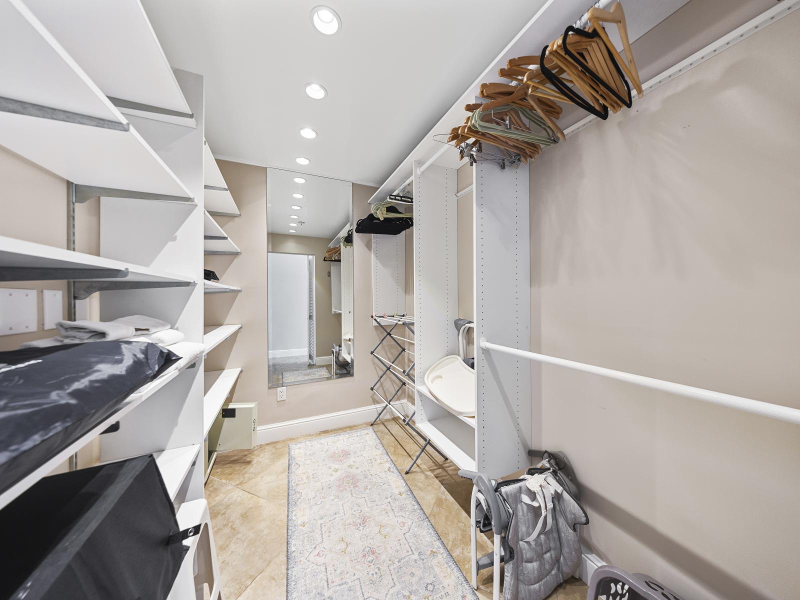 Stay organized with ease in the third bedroom walk-in closet, designed for maximum storage and style.