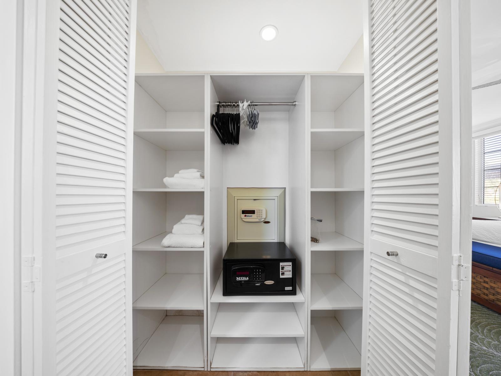 Closet in bedroom 4 with a hotel style safe