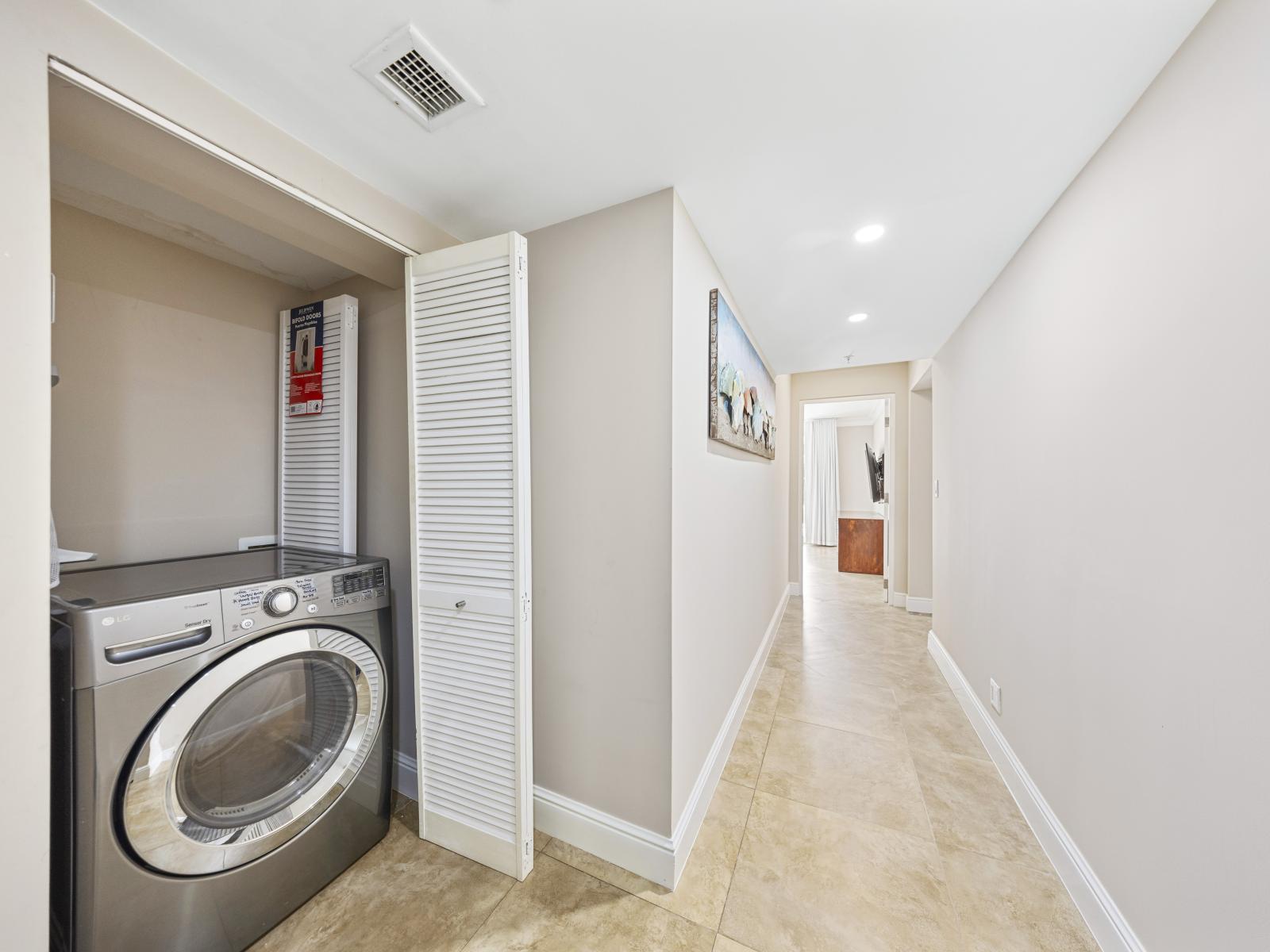 Effortless living: our modern laundry area offers everything you need for a stress-free stay