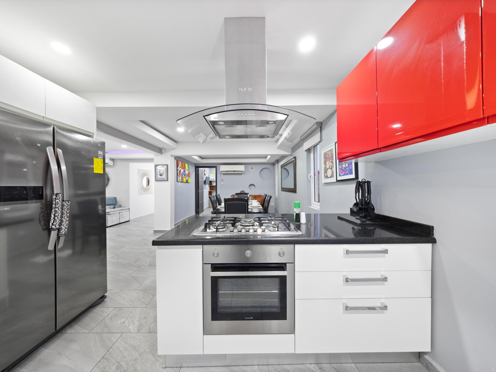 Step into culinary bliss with our fully equipped kitchen, where every tool and appliance await your culinary creations. From sleek countertops to state-of-the-art appliances, this kitchen is a haven for aspiring chefs and seasoned cooks alike.
