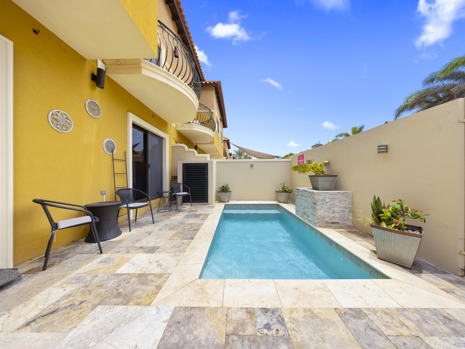 - Enjoy ultimate privacy and relaxation in the private pool of the townhouse in Noord, Aruba - Enjoy a peaceful swim in the privacy of the townhouse's own pool. - Relax in style with the townhouse's beautifully designed private pool area.