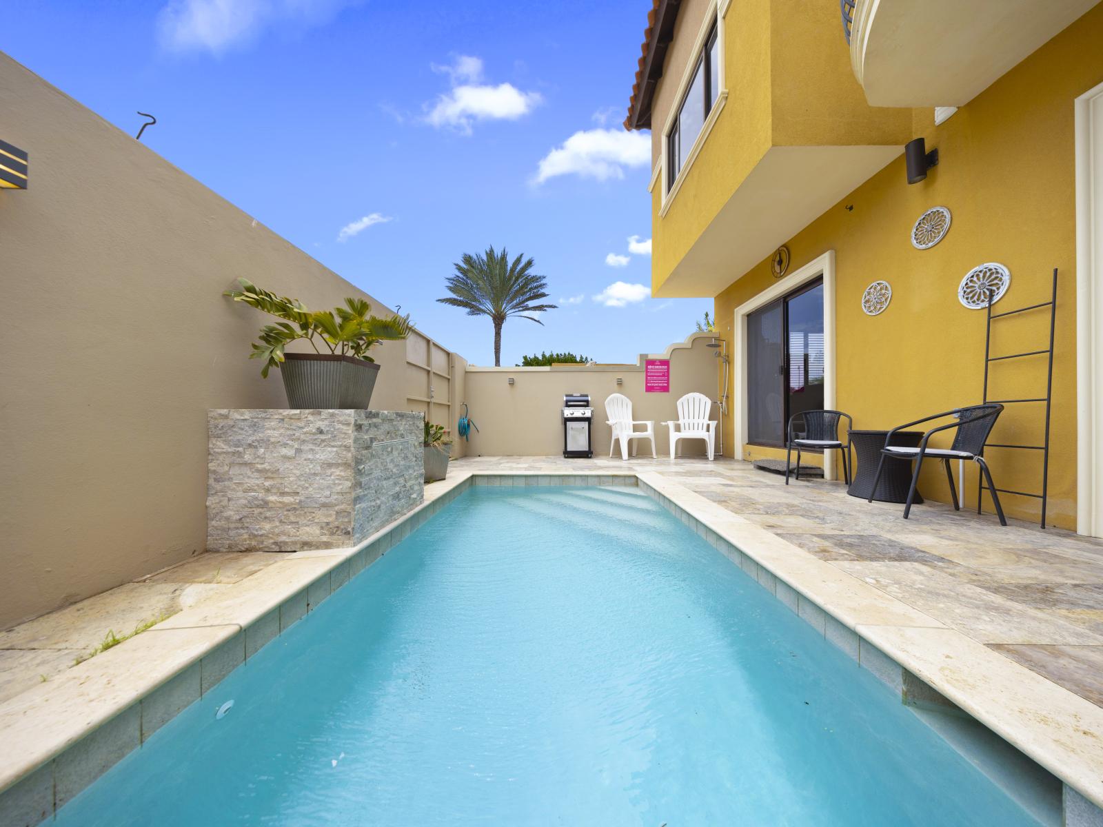 - Enjoy the luxury of your own private pool of the townhouse in Noord, Aruba. - The private pool area is spacious and inviting, ideal for lounging and soaking up the sun. - Experience complete privacy as you unwind by the pool a secluded retreat.