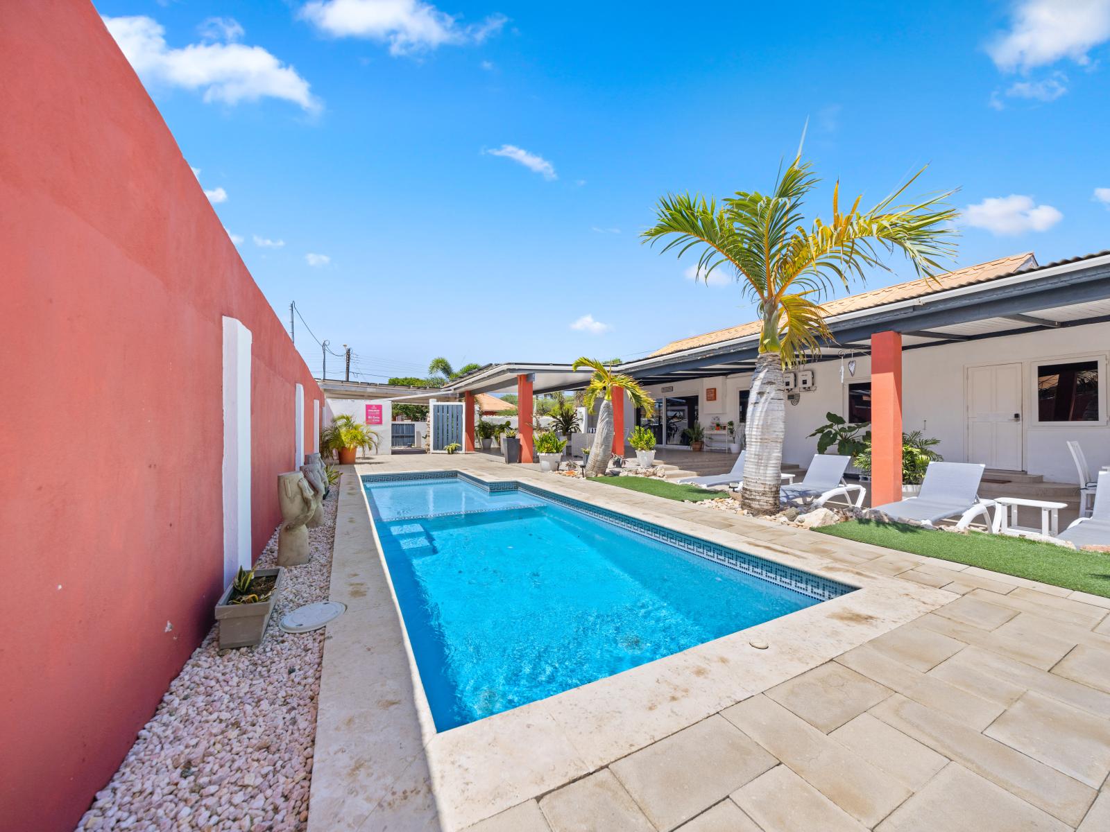 - Dive into the sparkling blue waters of our refreshing pool of the home in Oranjestad, Aruba - Experience the enchanting evening ambiance, with soft lighting illuminating the pool - Fire up the BBQ grill and enjoy poolside cookouts with loved ones