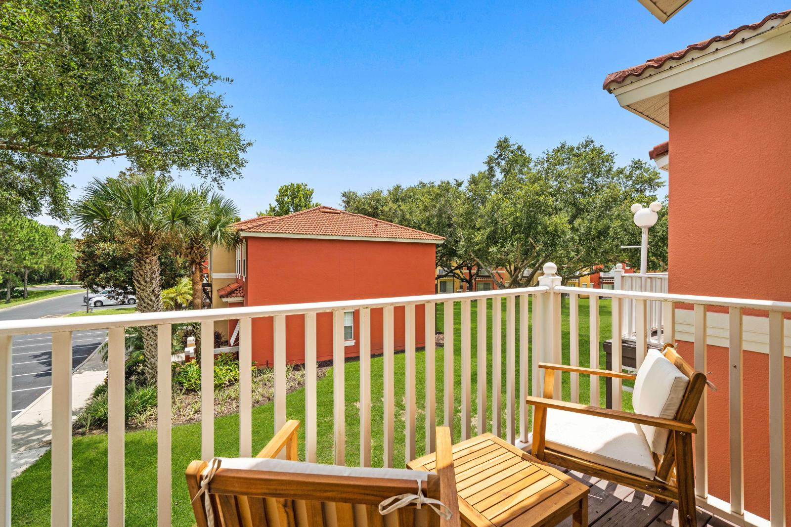 Soak in breathtaking views and fresh air from the private balcony of the townhouse in Kissimmee Florida - Immerse yourself in the picturesque view of the charming neighborhood - Plush seating,  perfect to unwind and soak in the peaceful environment