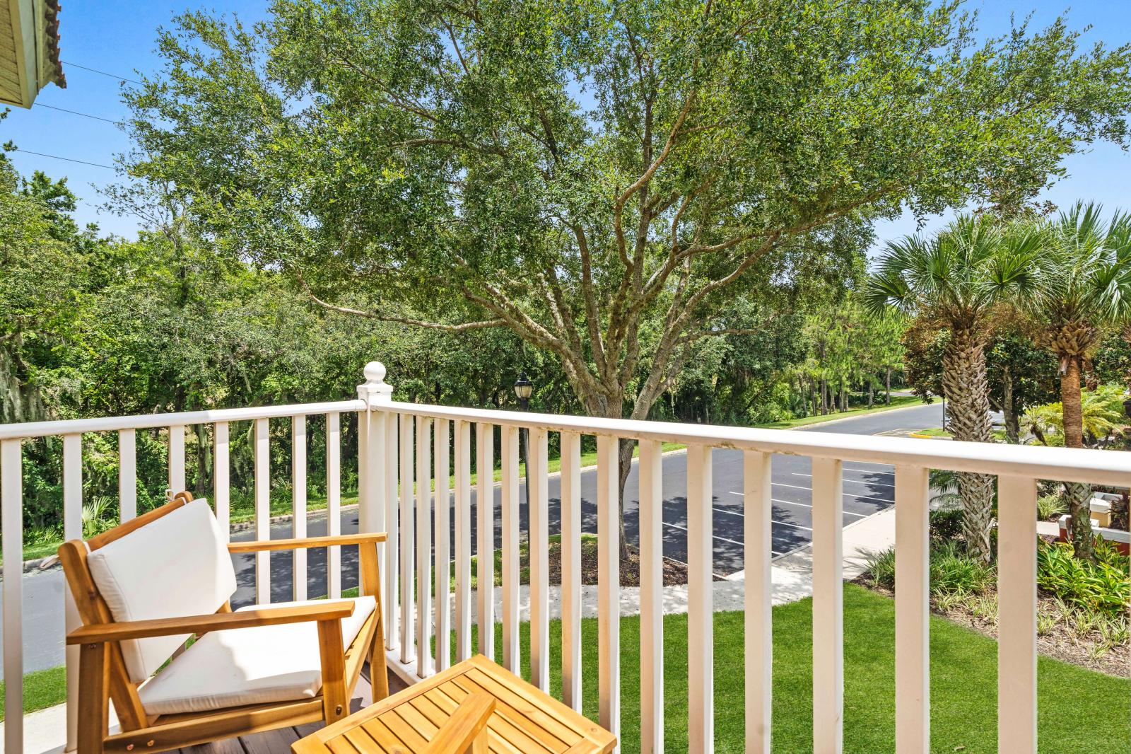 Step out onto the private balcony, offering a peaceful retreat with comfortable seating - Outdoor space is perfect for unwinding, reading a book, or enjoying a glass of wine while taking in the fresh air - An ideal extension of the living space