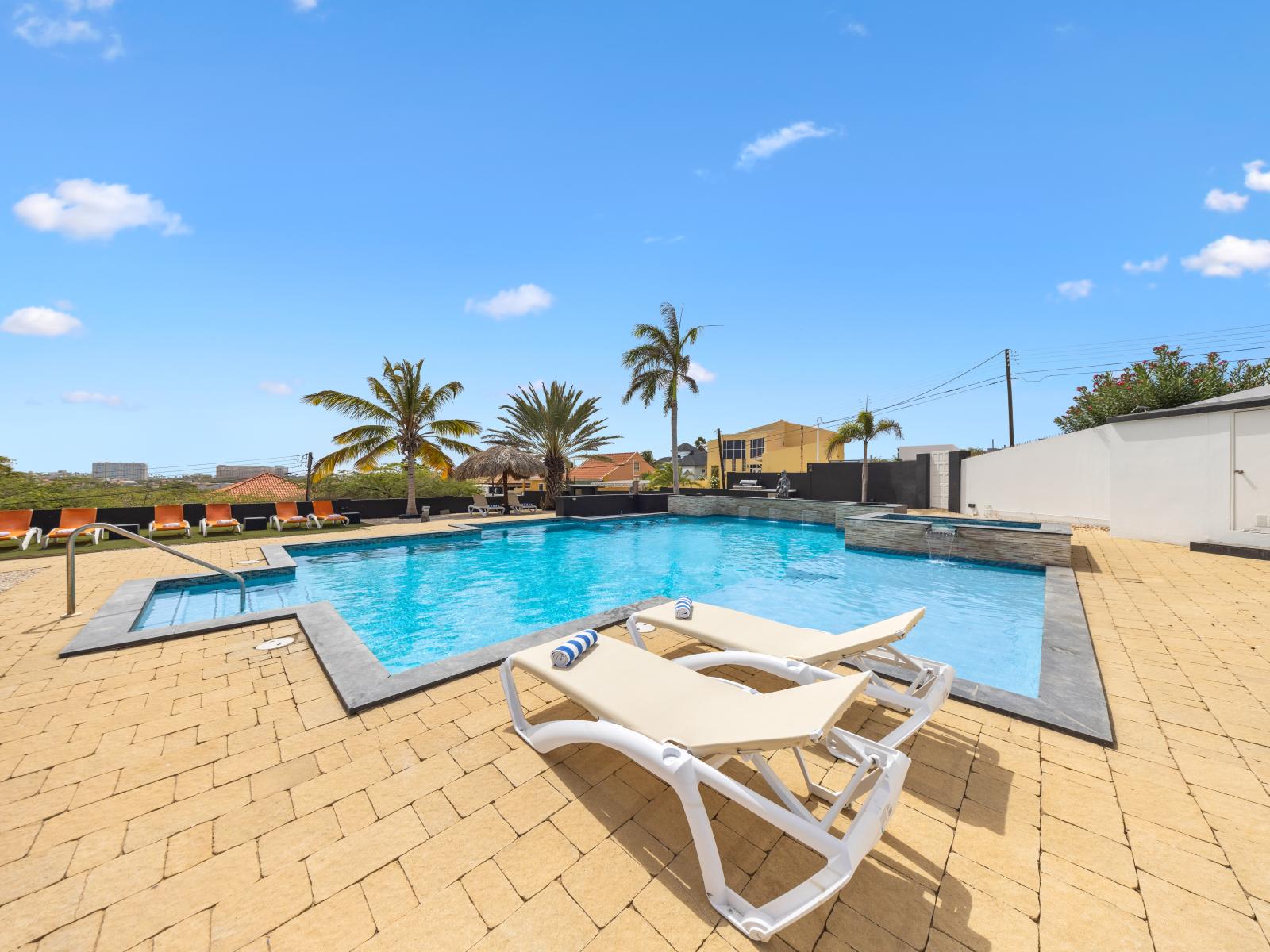 lounge chairs by the pool