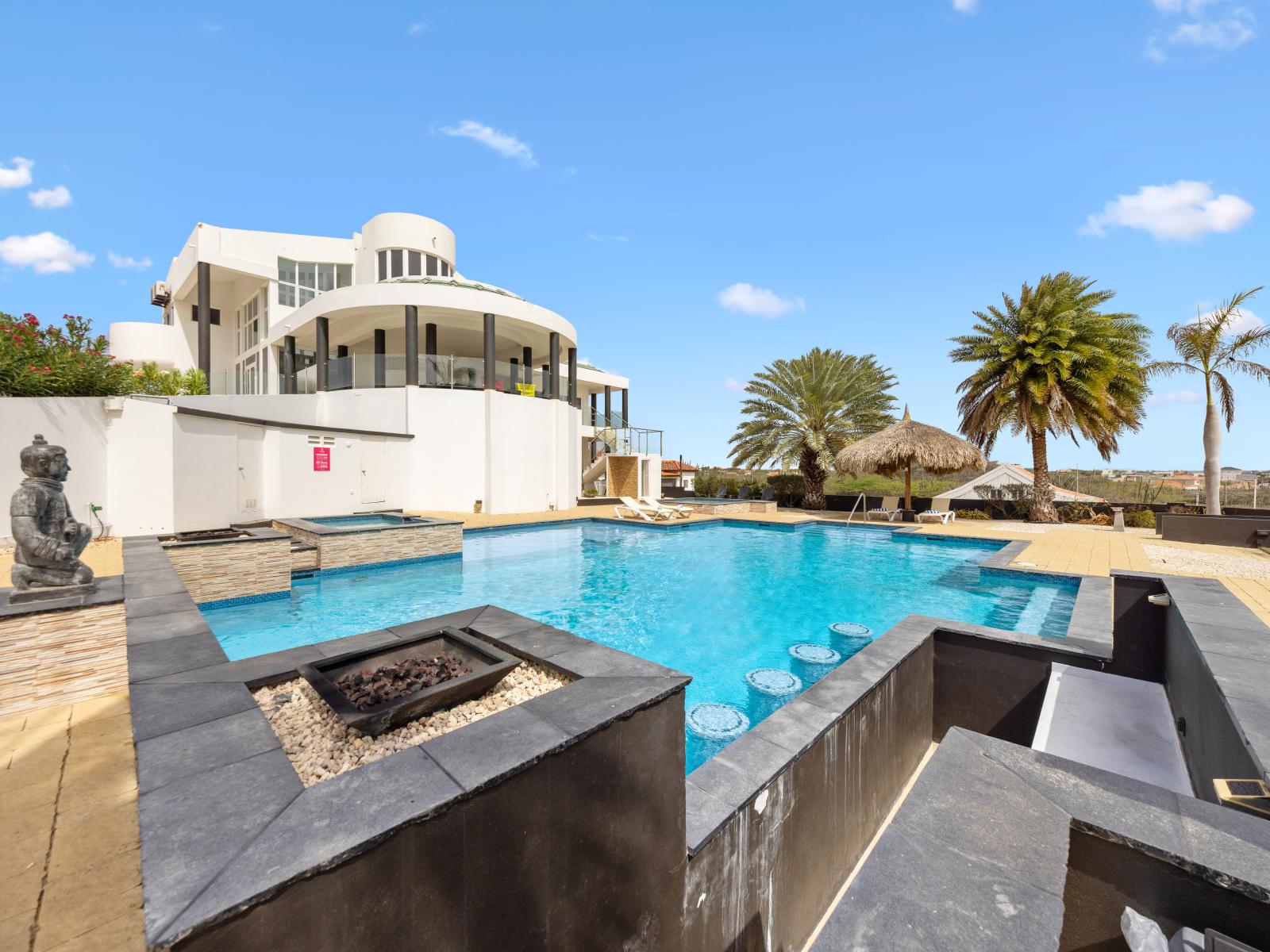 outdoor fire pit by the pool