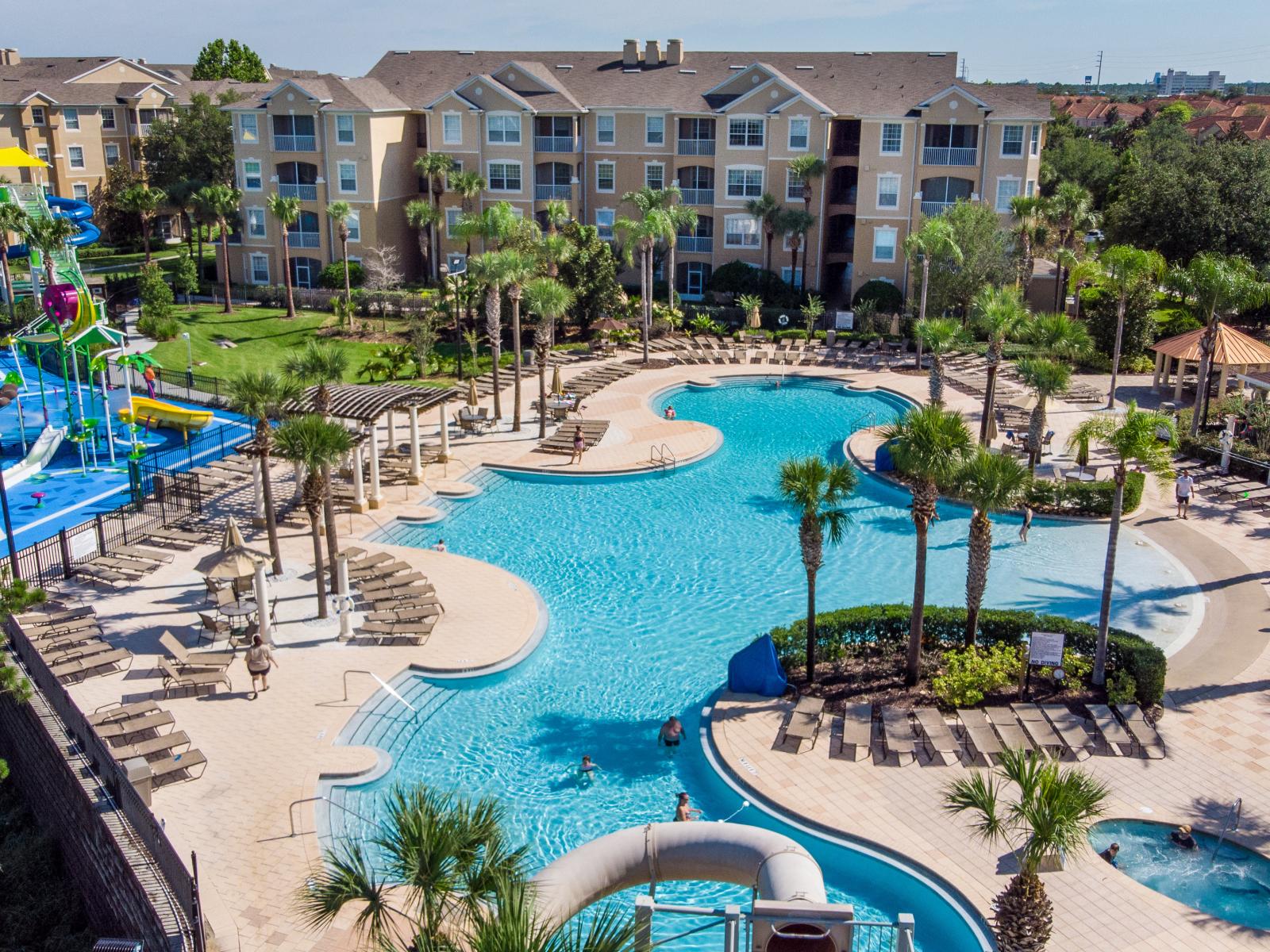 Enjoy free access to resort-style amenities, including a stunning pool, water park, hot tub, sun loungers, and shaded cabanas.