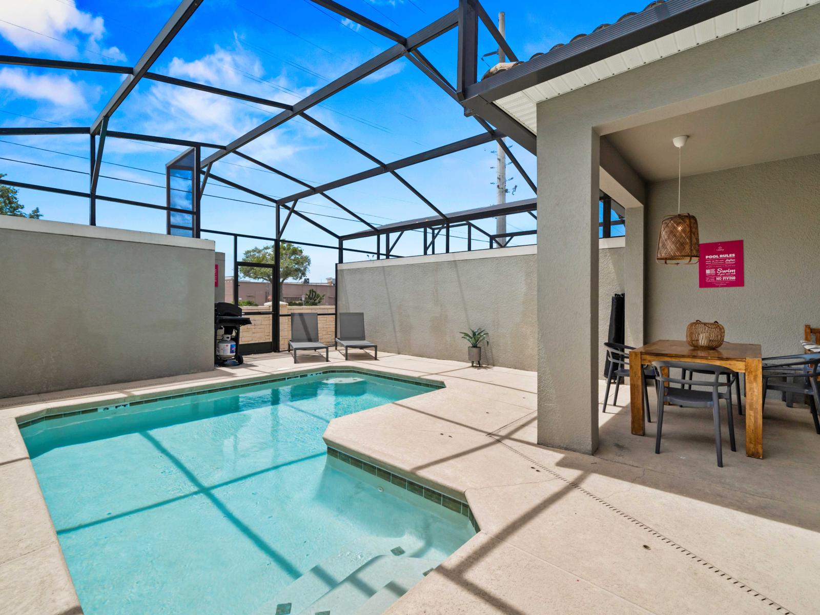 - Enjoy access to your private pool perfect for a refreshing dip under the sunny sky - Savor meals in the cozy outdoor dining area with modern furnishings - Spacious covered patio offers an ideal space to relax all just steps away from the pool