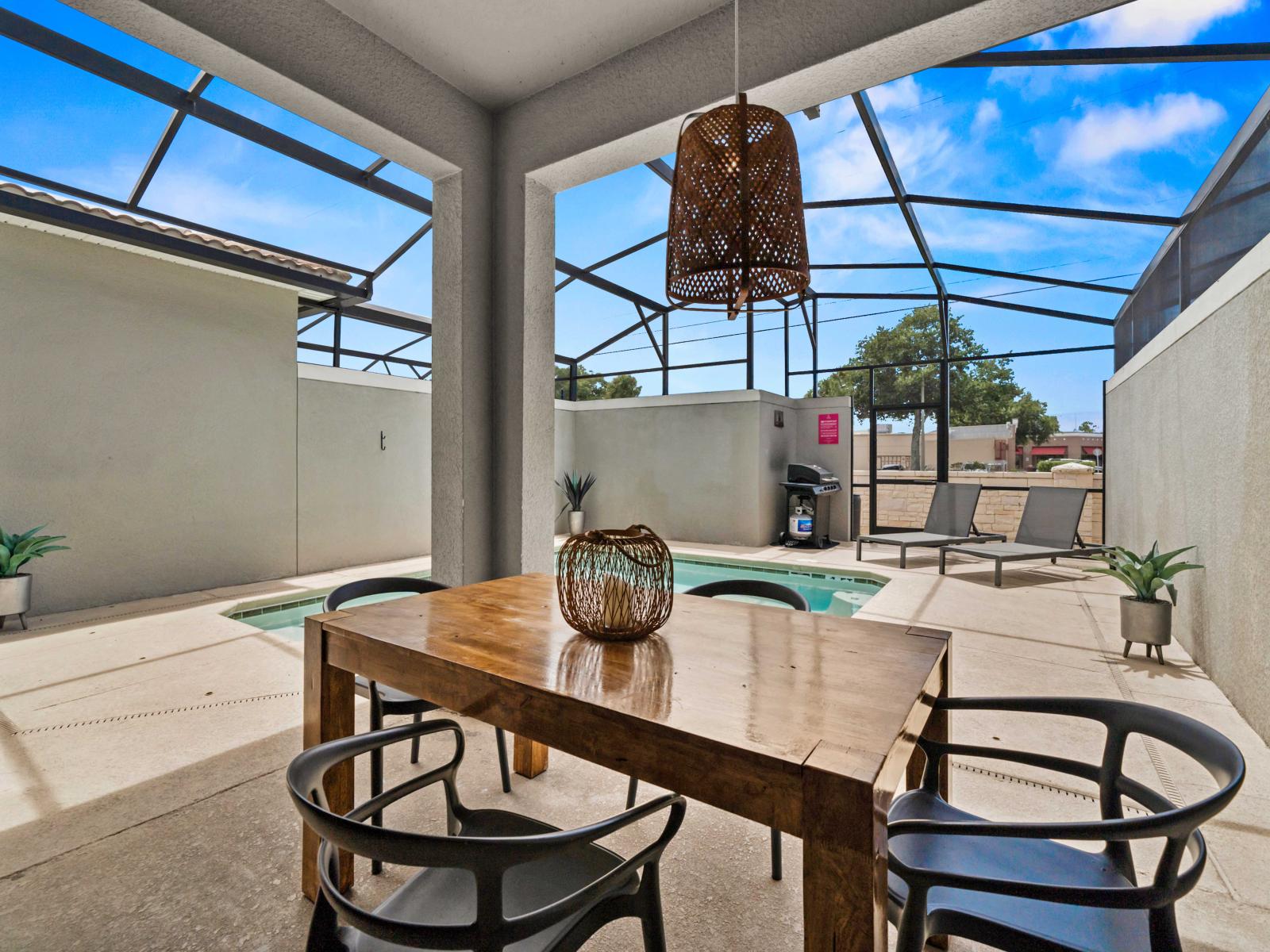 - Enjoy meals in the shaded outdoor dining area perfectly positioned by the pool - Stylish decor and open design create a serene atmosphere for dining and relaxation - Lounge in the sun or conveniently fire up the grill for outdoor cooking and fun