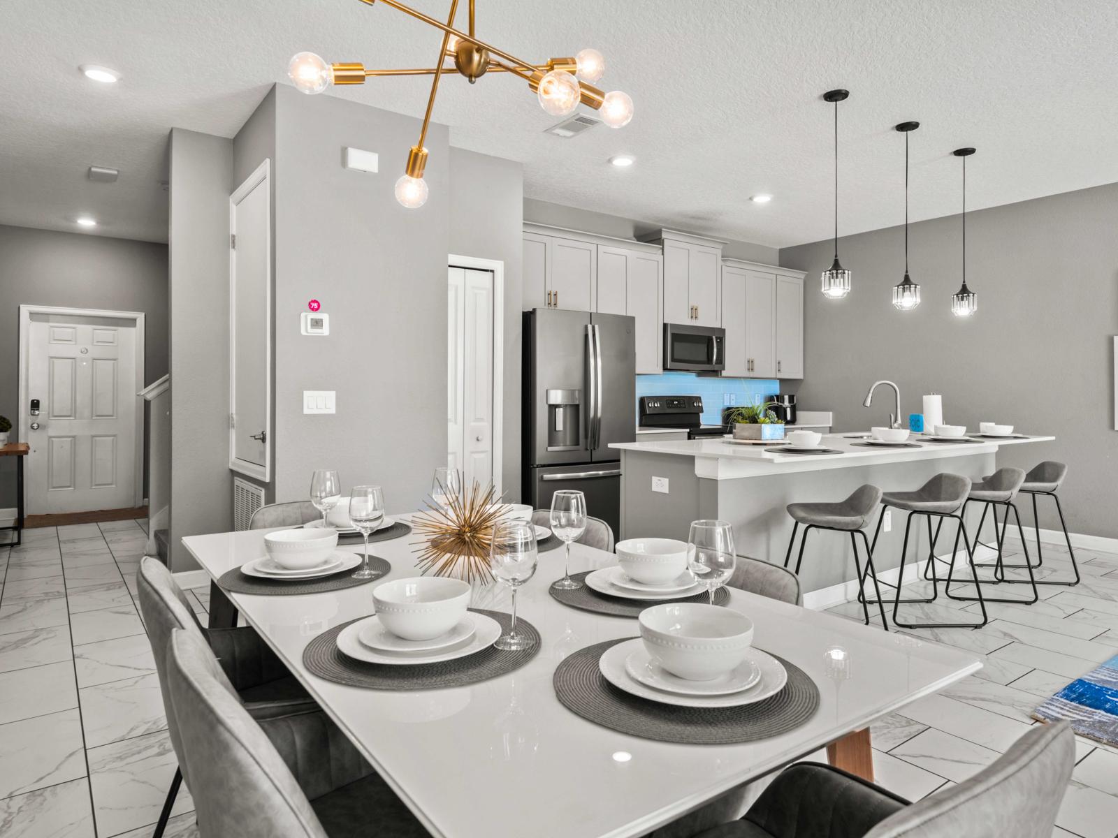 - Relax in the spacious living area with modern furnishings &cozy sectional sofa - Open-concept design connects living room to the fully equipped kitchen &dining area - Thoughtfully designed layout is ideal for spending quality time with family