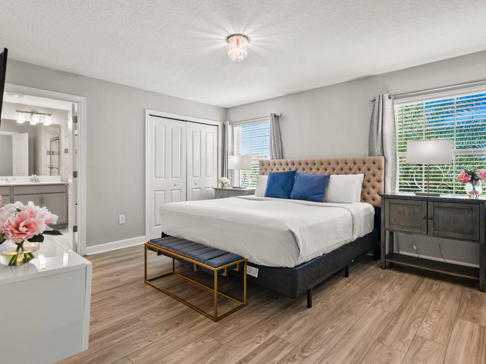 - Retreat to this elegant main bedroom featuring a plush king-size bed and a private en-suite bathroom - Bright and serene, with thoughtful decor for ultimate comfort - Your personal retreat for relaxation, complete with modern amenities