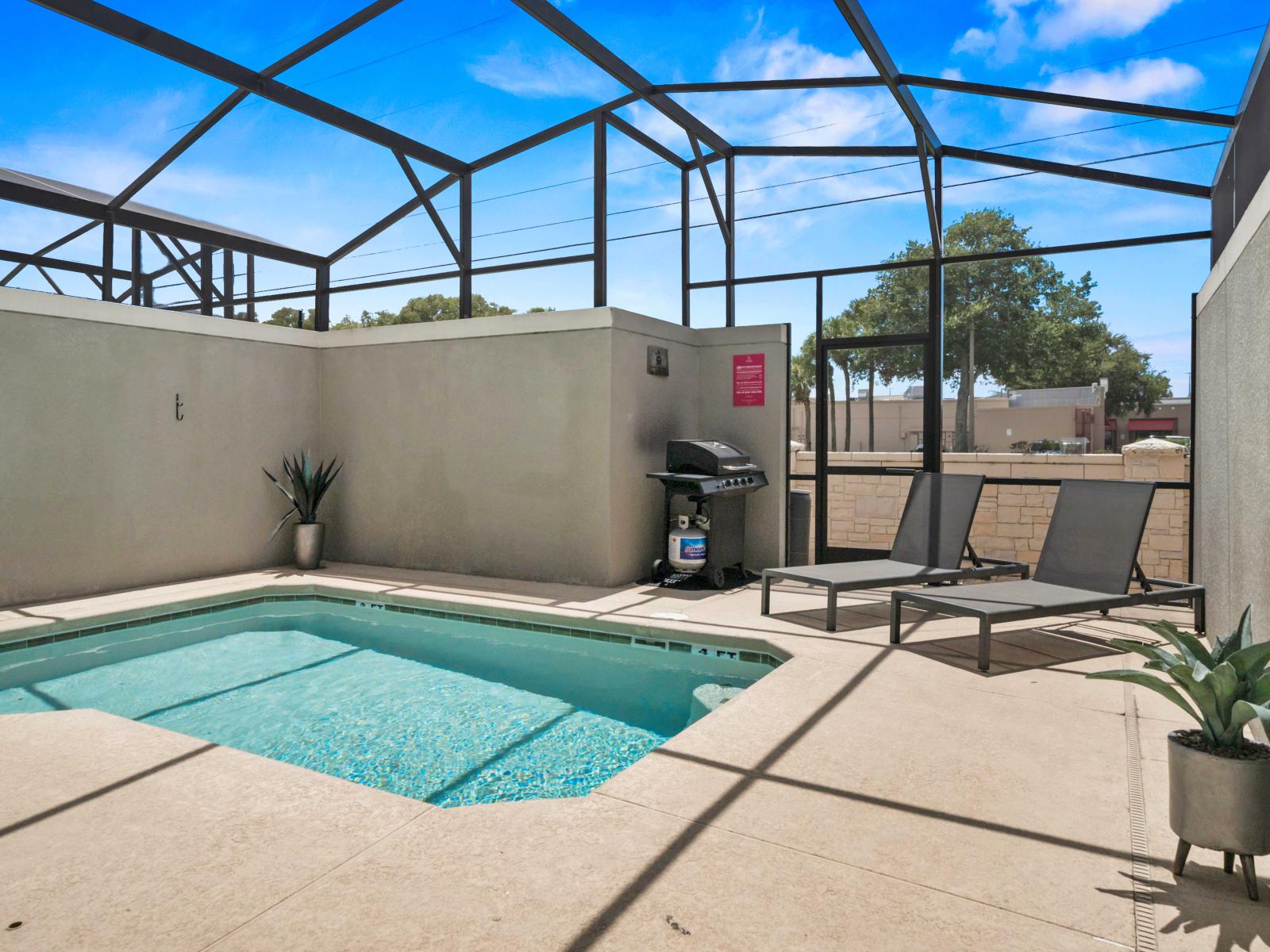 - Enjoy outdoor dining with a BBQ grill and relax on poolside lounges in your private patio - Perfect for sunny days, offering a mix of grilling and lounging by the pool - Unwind and savor meals in this serene, well-equipped outdoor space