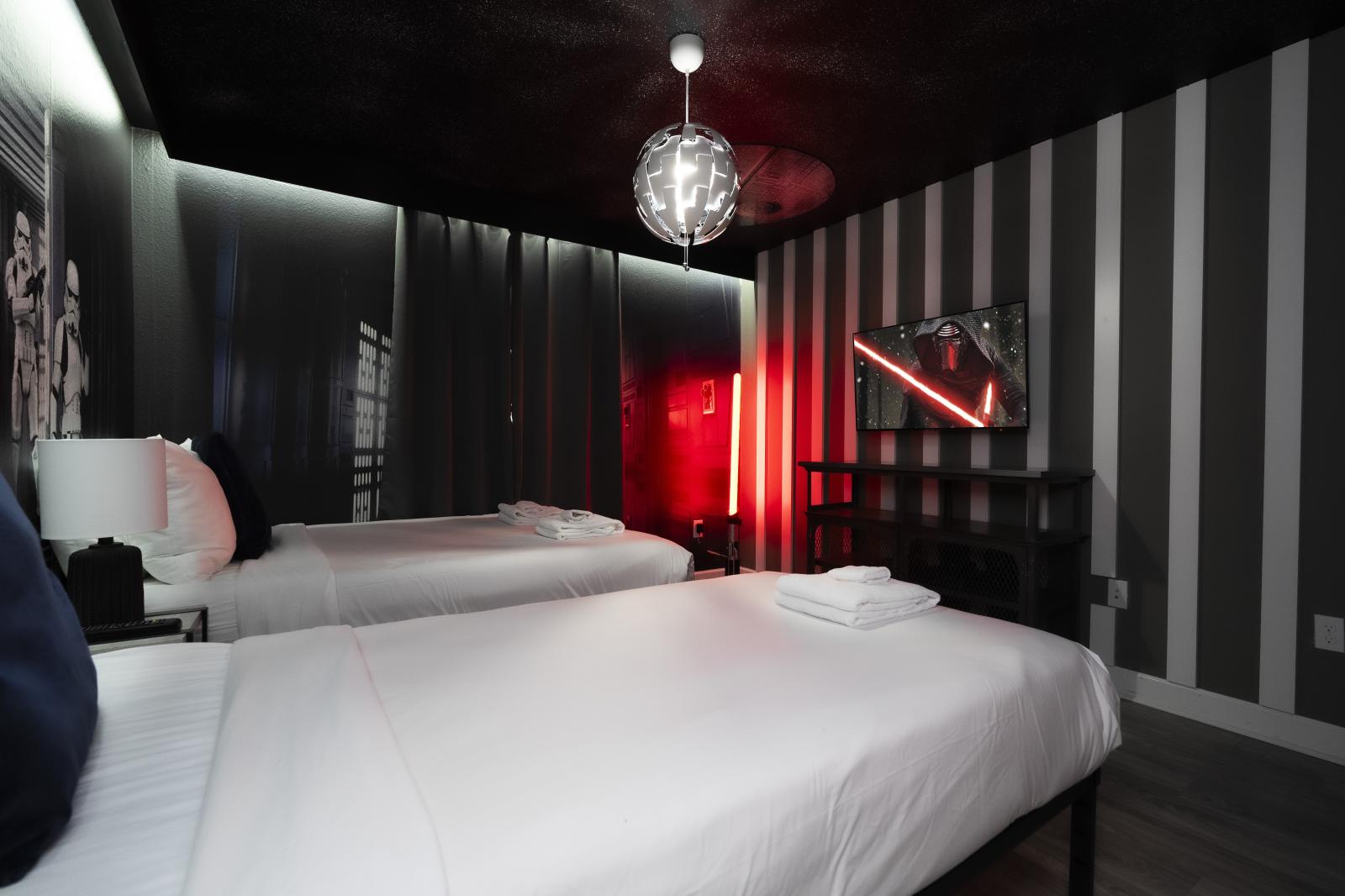 Star Wars-themed room with a single and double bed—sleep among the stars!