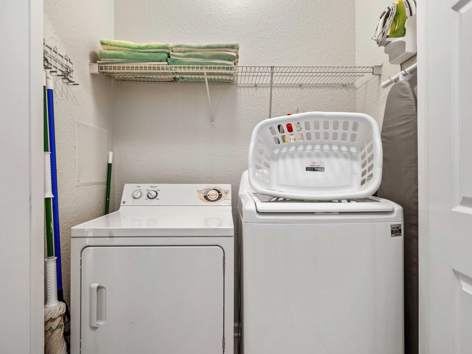 - Convenient in-unit laundry area with a washer and dryer available for your use - Shelving above the machines provides space for storing laundry essentials and linens - A practical setup that makes keeping up with laundry easy during your stay