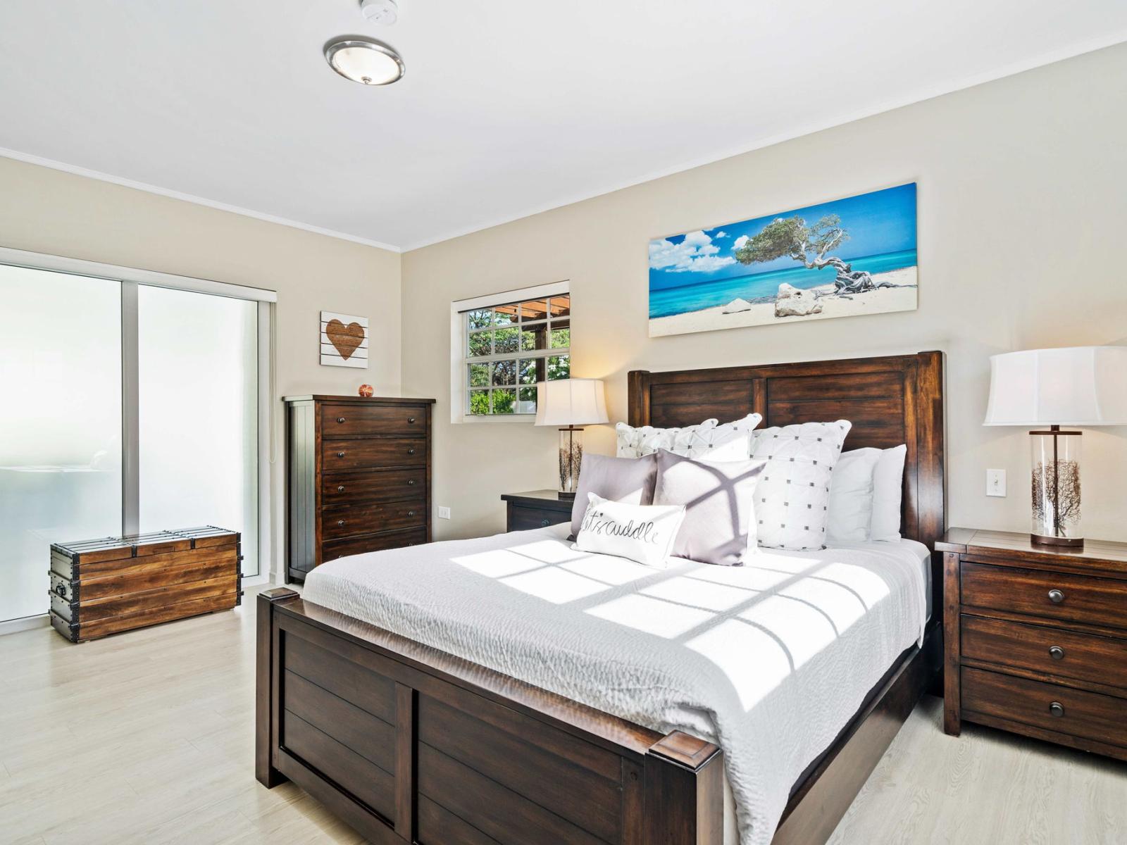 Experience the perfect blend of comfort and elegance in our beautifully appointed bedroom - Inviting atmosphere for relaxation and an attached bathroom for convenience and privacy - Carefully selected blend of colors and elegant lighting fixtures